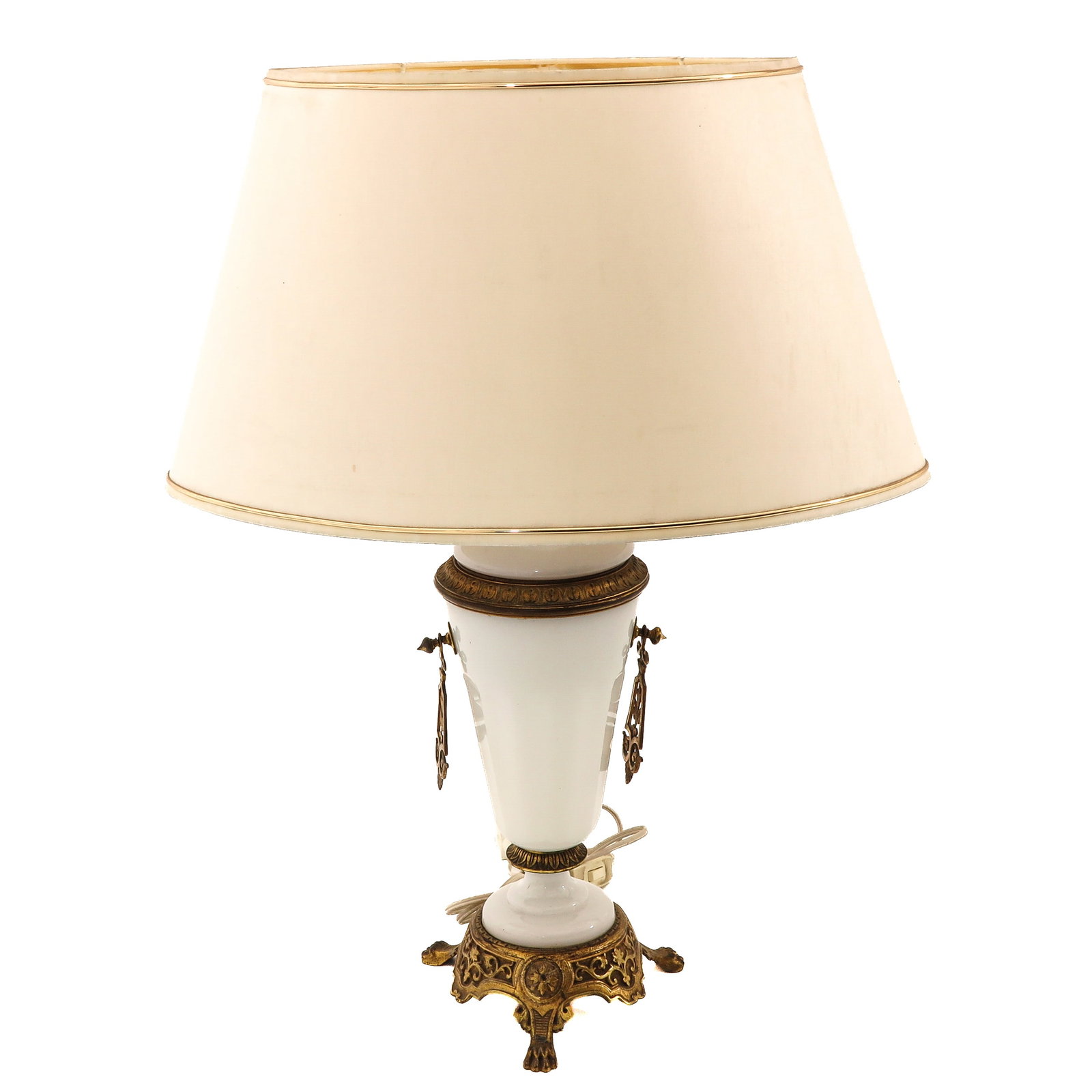 A Table Lamp: white glass, with gilt metal mounts, with lampshade, height 63 cm.