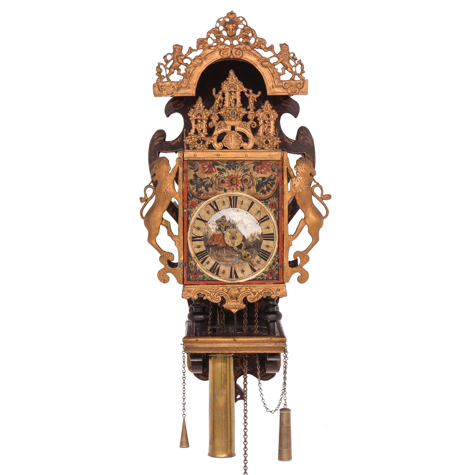 A Dutch Fresian Wall Clock: with painted dial and gilt side pieces in the form of lions, 18th / 19th century, height 70 cm.