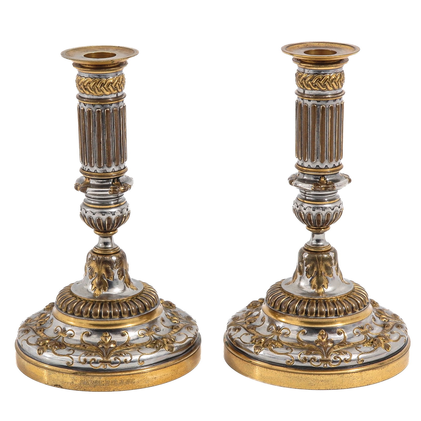 A Pair of Candlesticks: candlesticks, Ferdinand Barbedienne, silver-plated bronze, decorated with acanthus leaves and garlands, height 23 cm.