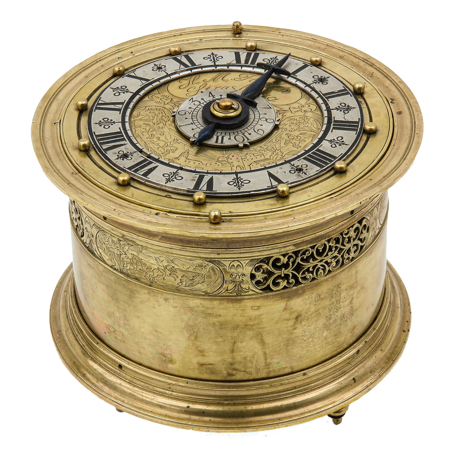 A Table Clock: Strasbourg, ca. 1670, gilt brass case, diameter 12 cm., height 9 cm.