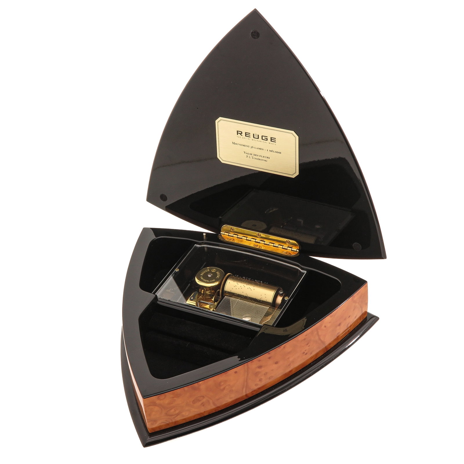 A Reuge Music Box: Reuge, the lid with wood inlay of calla lilies, Swiss, 22 x 6 x 20 cm.