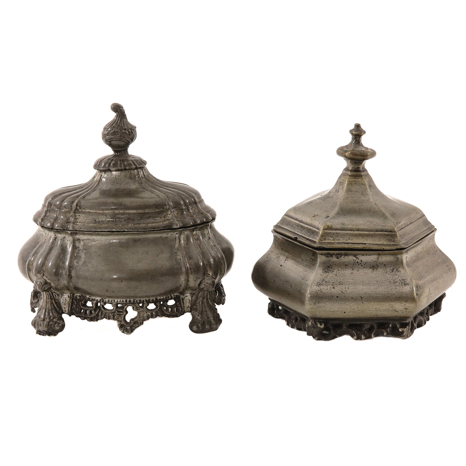 A Lot of 2 18th Century Tobacco Jars: consisting of 2 18th-century pewter tobacco jars, with Dutch hallmarks, tallest 16 cm.