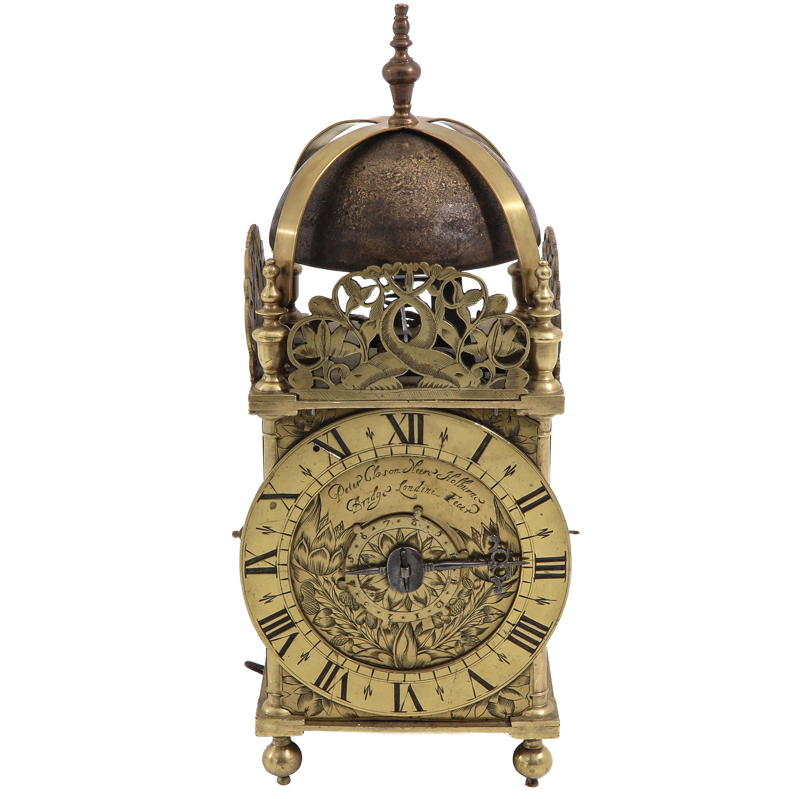 A Lantern Clock: signed Peter Closon, ca. 1650, brass case with engraved dial, verge escapement, height 38 cm.