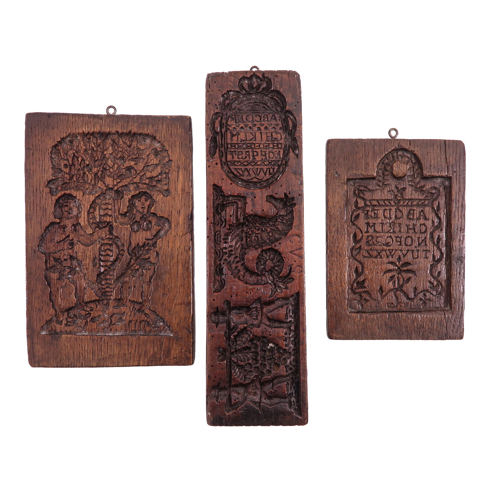 A Collection of Rare Cookie Boards: consisting of 3 rare carved wooden cookie boards, 18th century, including depictions of Adam and Eve, a and sea creature, largest 30 cm.