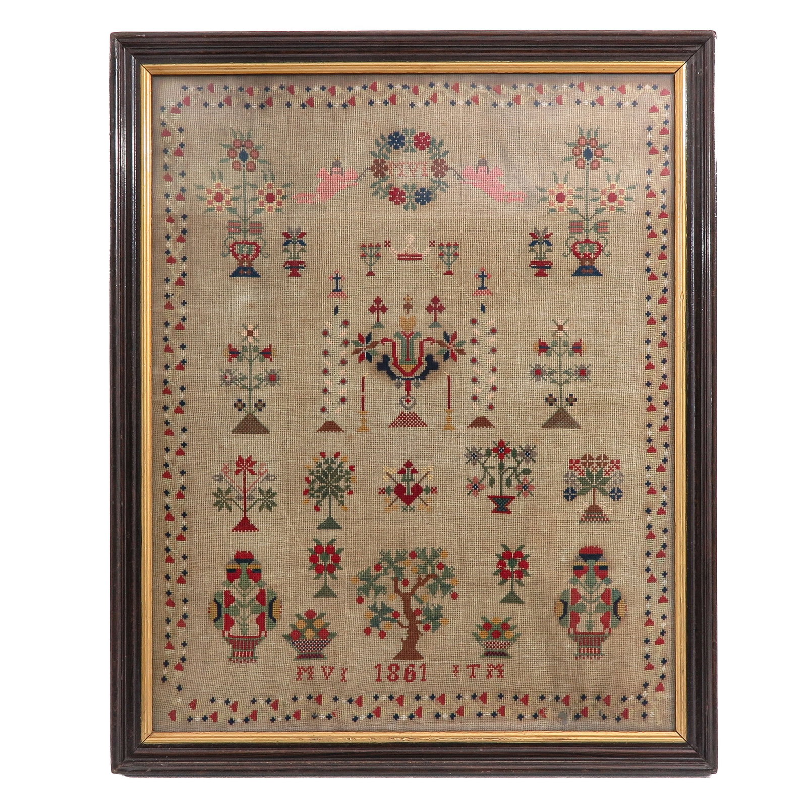 A Sampler: with various floral motifs, birds, vases, hearts and tree of life, dated 1861, 54 x 68 cm.
