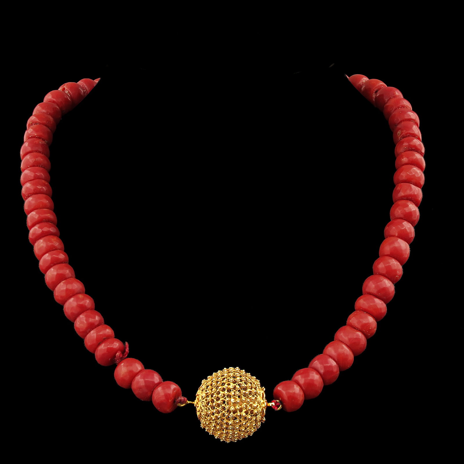 A Red Coral Necklace: with 1 row 19th-century red coral with gold clasp, diameter beads 10 - 11 mm., deep red colour, weight 79 grams