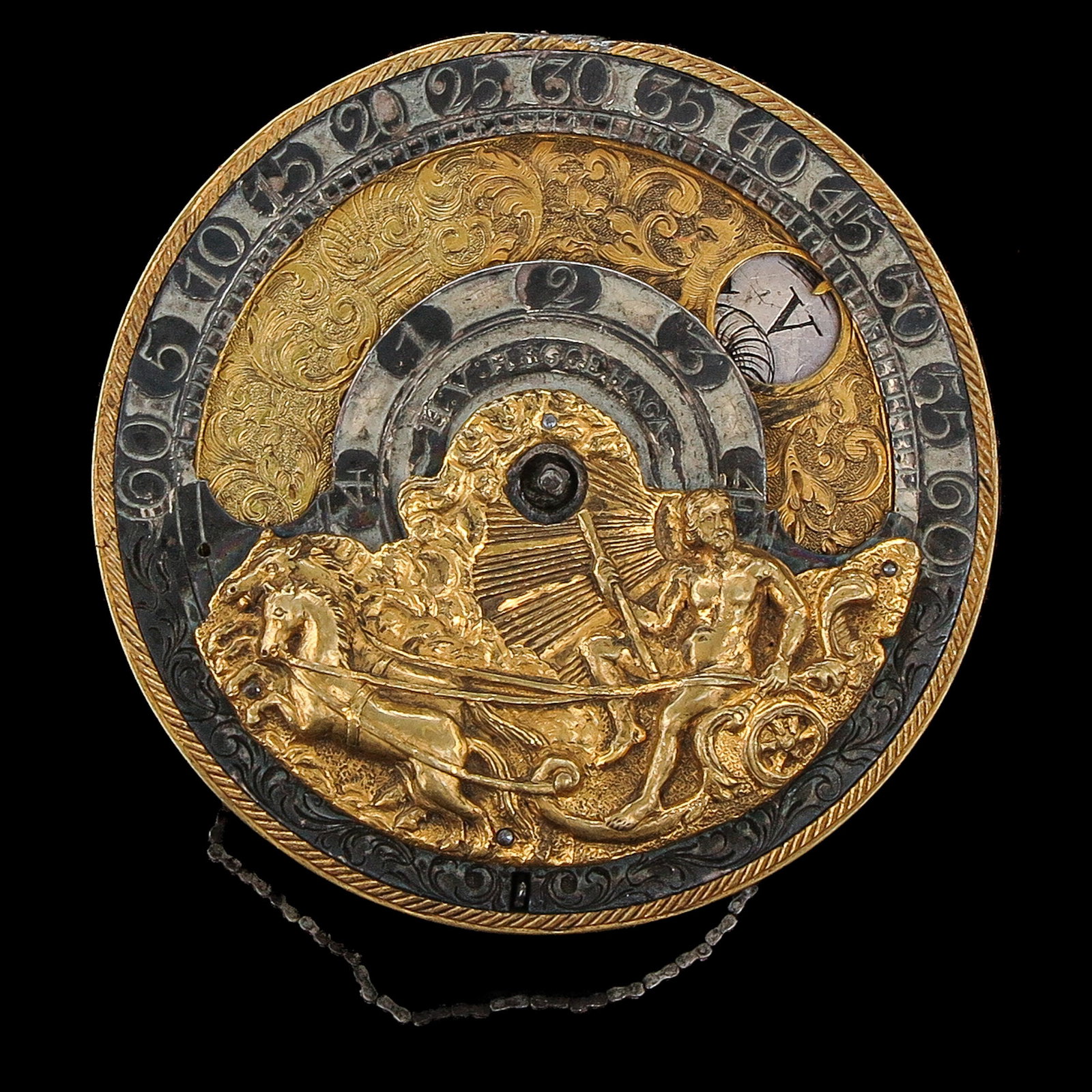 A Movement: signed Hegge The Hague, with gilt and engraved dial with a classical figure in a chariot, so-called wanderinghours, diameter 44 mm.