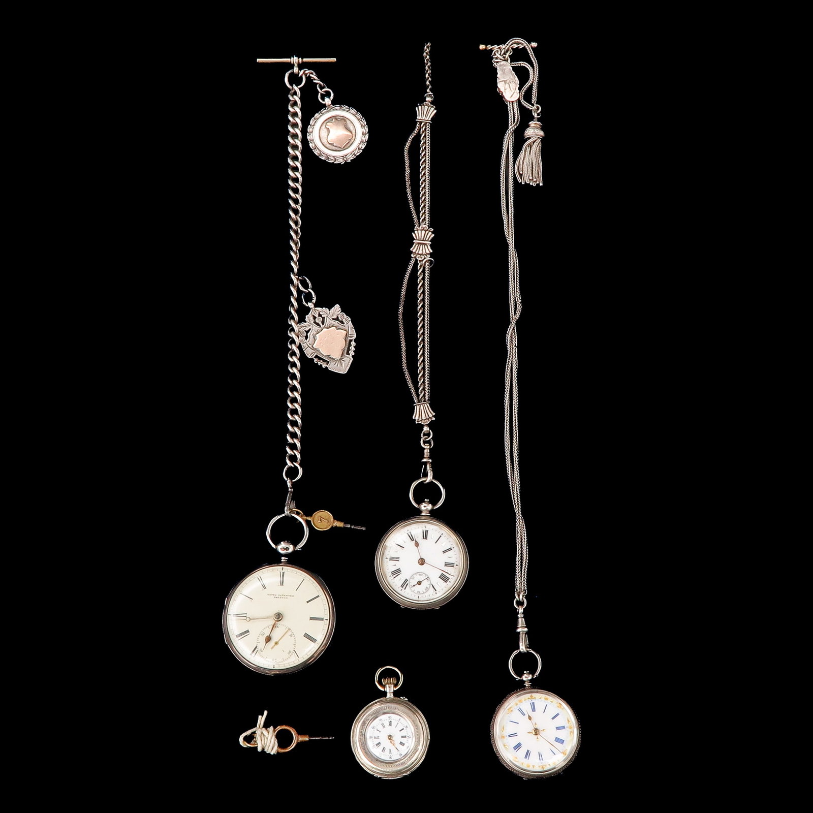 A Collection of Pocket Watches: consisting of various pocket watches, partly with chatelaine and keys, largest case diameter 45 mm.