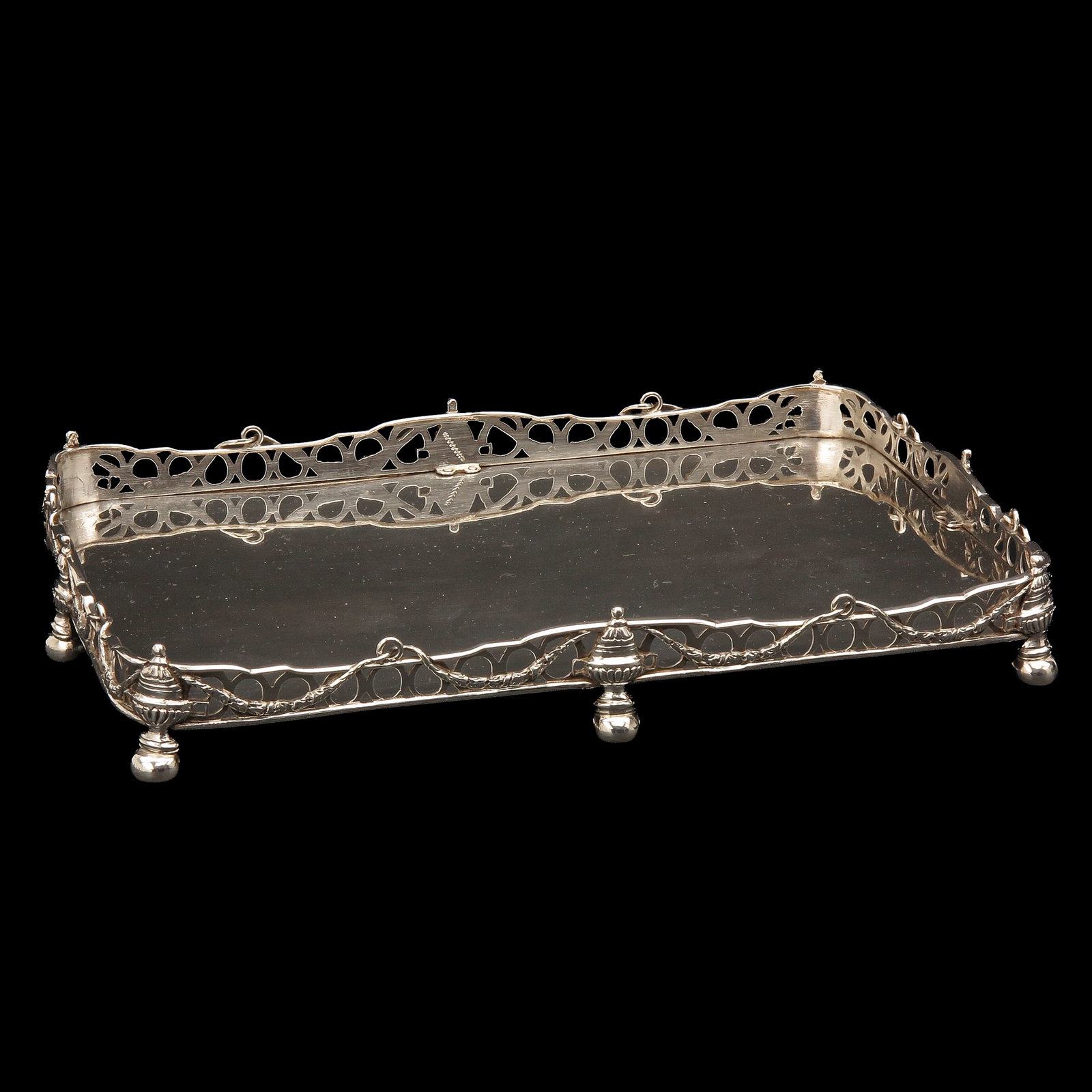 A Silver Cabaret: silver, Leeuwarden, hallmarked with the maker's mark of Hendrik Dauw, 1781, with engraved inscription concerning gratitude for the maker of music, the city mark of Leeuwarden and presumably the