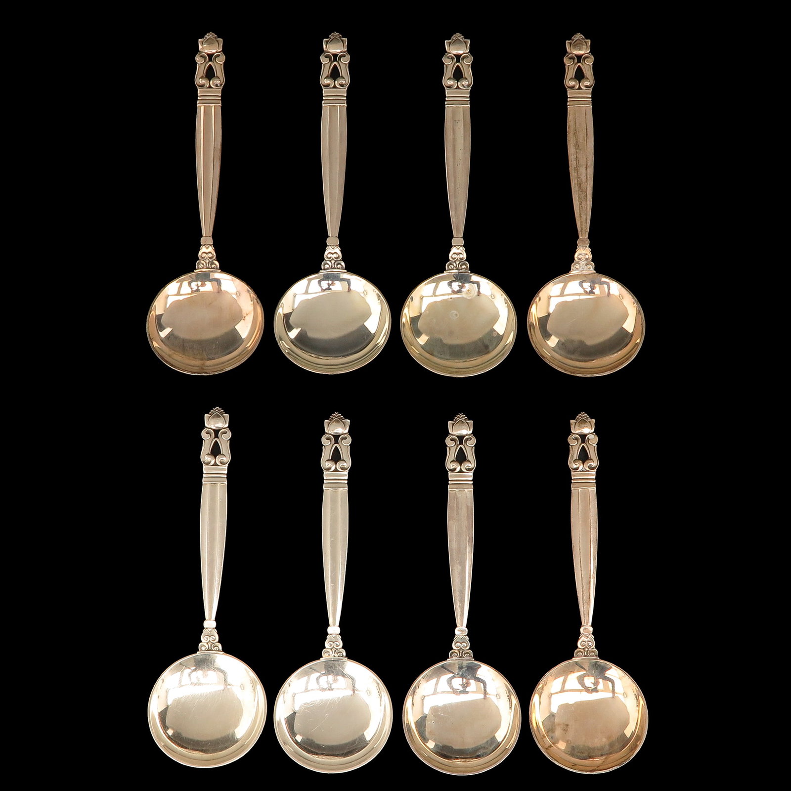 A Set of Georg Jensen Cutlery: consisting of 8 bouillon spoons, sterling silver, Georg Jensen, model Acorn, designed by Johan Rohde, length 15 cm.
