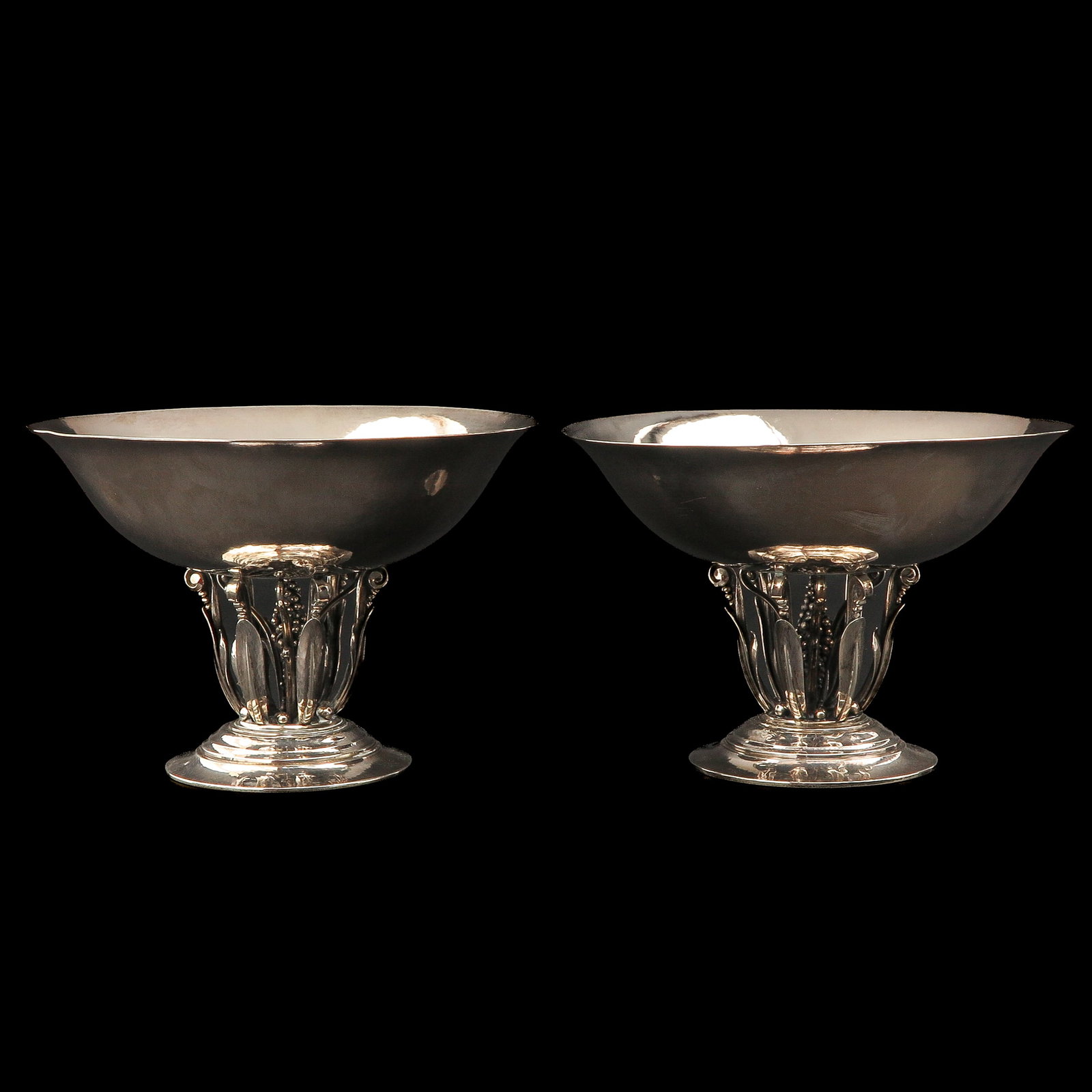 A Pair of Georg Jensen Louvre Coupes: Louvre coupes, sterling silver, Georg Jensen, model Acorn, designed by Johan Rohde, height 14 cm.