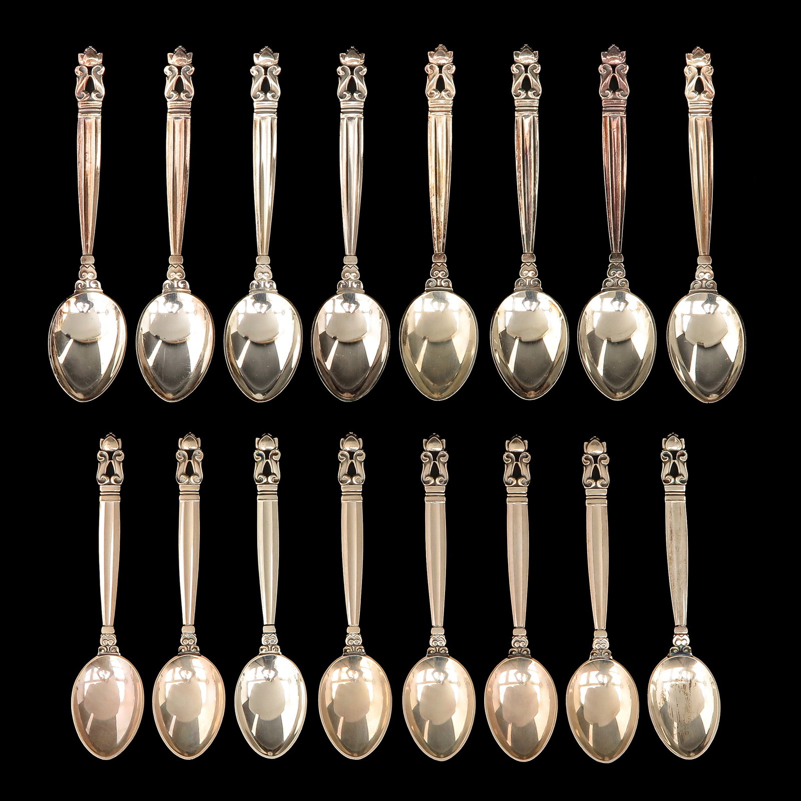 A Set of Georg Jensen Cutlery: consisting of 8 coffee spoons and 8 mocha spoons, sterling silver, Georg Jensen, model Acorn, designed by Johan Rohde, longest 13 cm.