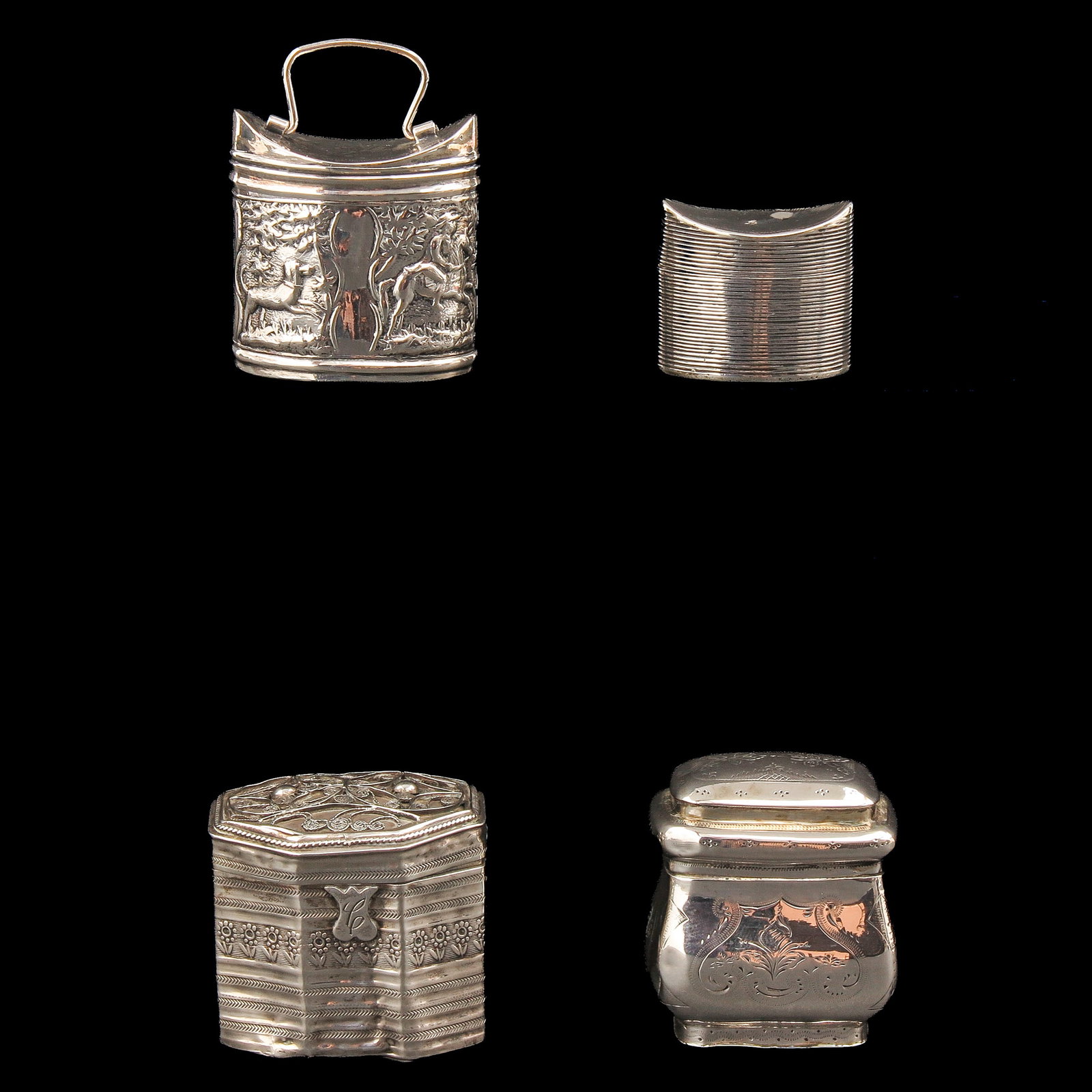 A Collection of Loderein Boxes: consisting of 4 silver loderein boxes, tallest 4 cm.
