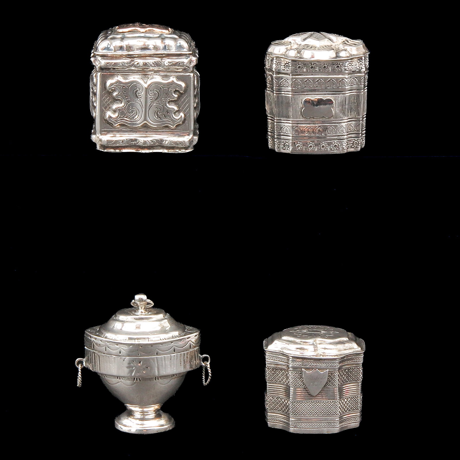 A Collection of Loderein Boxes: consisting of 4 silver loderein boxes, tallest 4 cm.