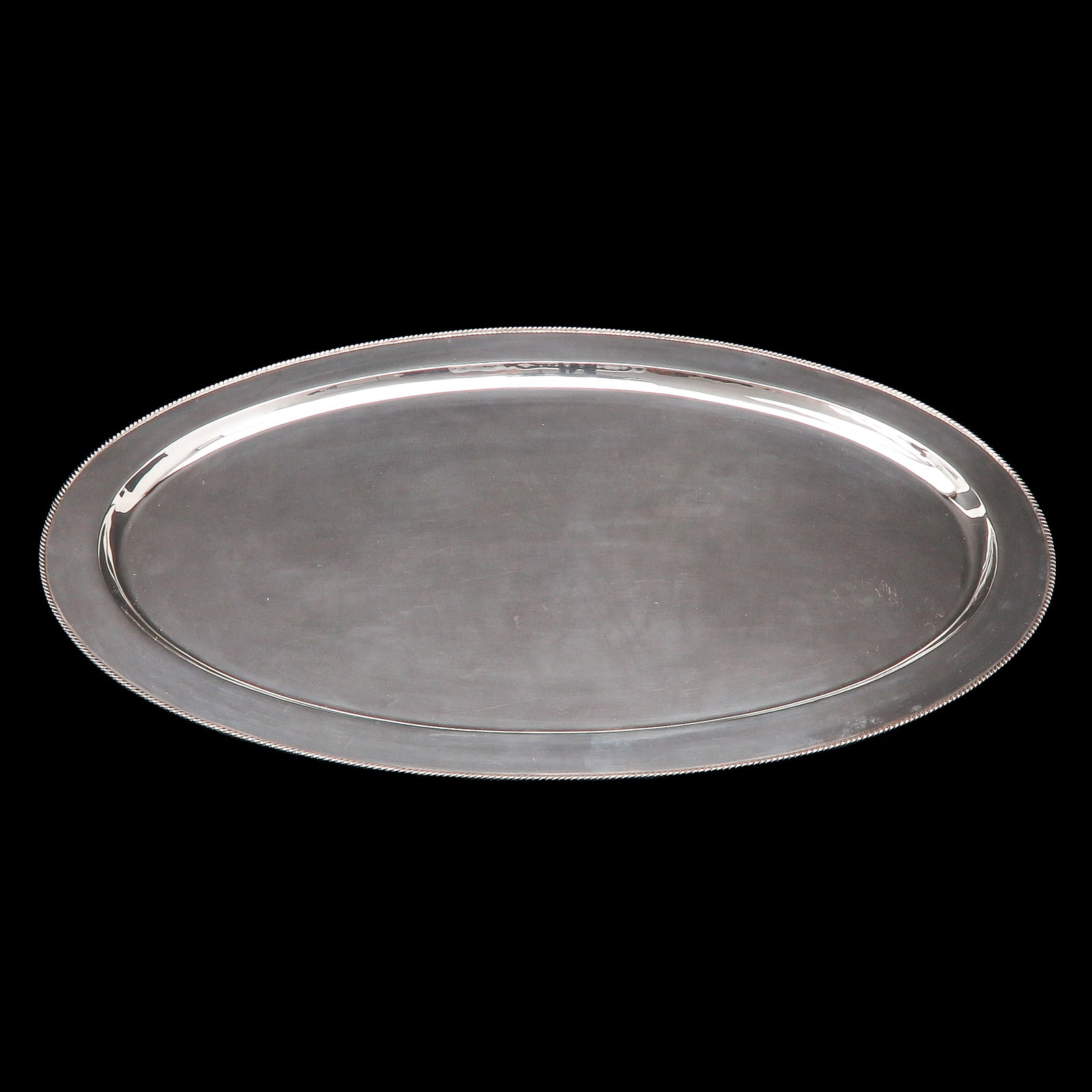 A Silver Tray: 900/1000 silver, length 62 cm.
