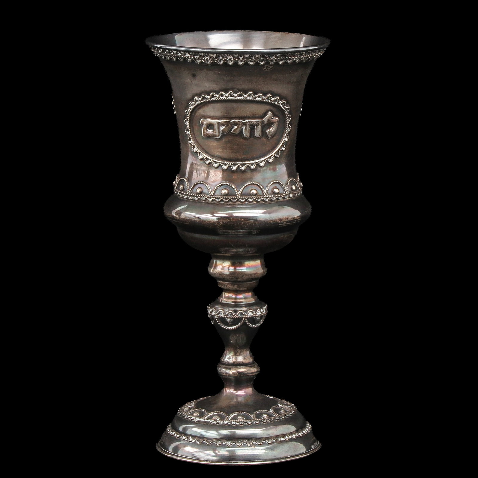 A Jewish Silver Beaker: on foot, Jewish silver, height 17 cm.