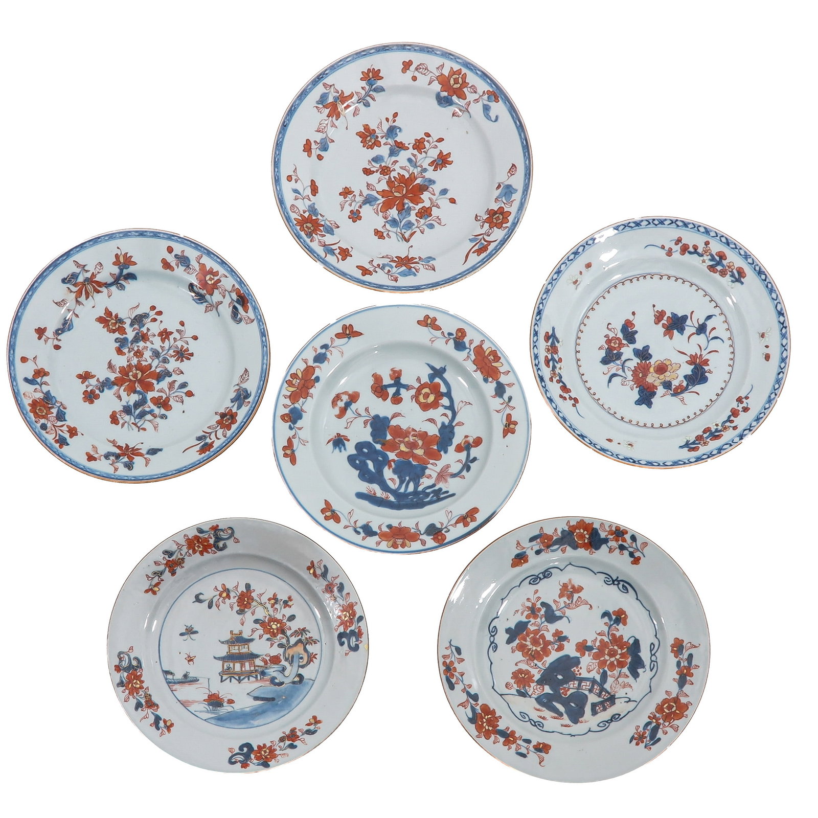 A Group of 6 Imari Plates: Floral decor in iron red and gilt enamels, 18th Century, 23 cm.