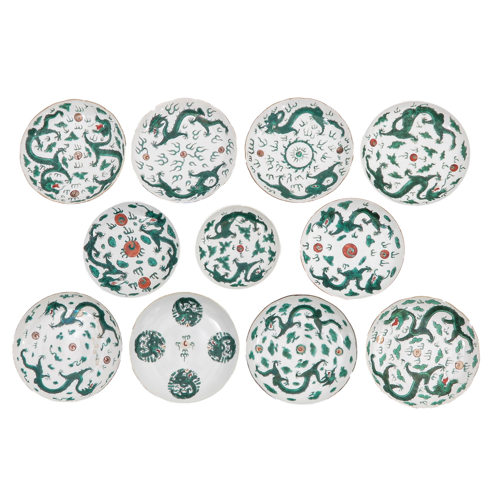 A Group of Dragon and Cloud Plates: 11 plates, Daoguang Mark and Period, largest plates are 18 cm. in diameter, chip and hairline.