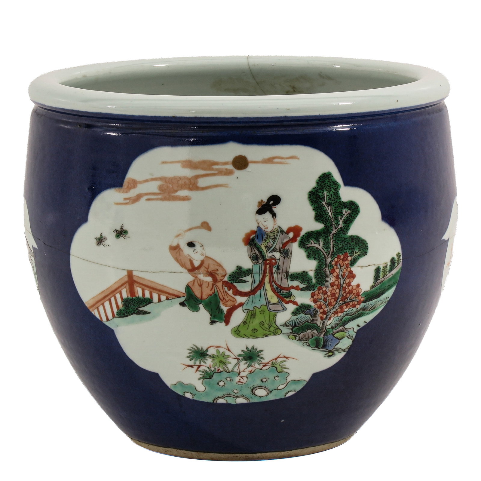 A Famille Verte Fish Bowl: Cobalt blue ground with shaped panels depicting figures in garden landscapes, 19th Century, 26 cm. tall, restored.