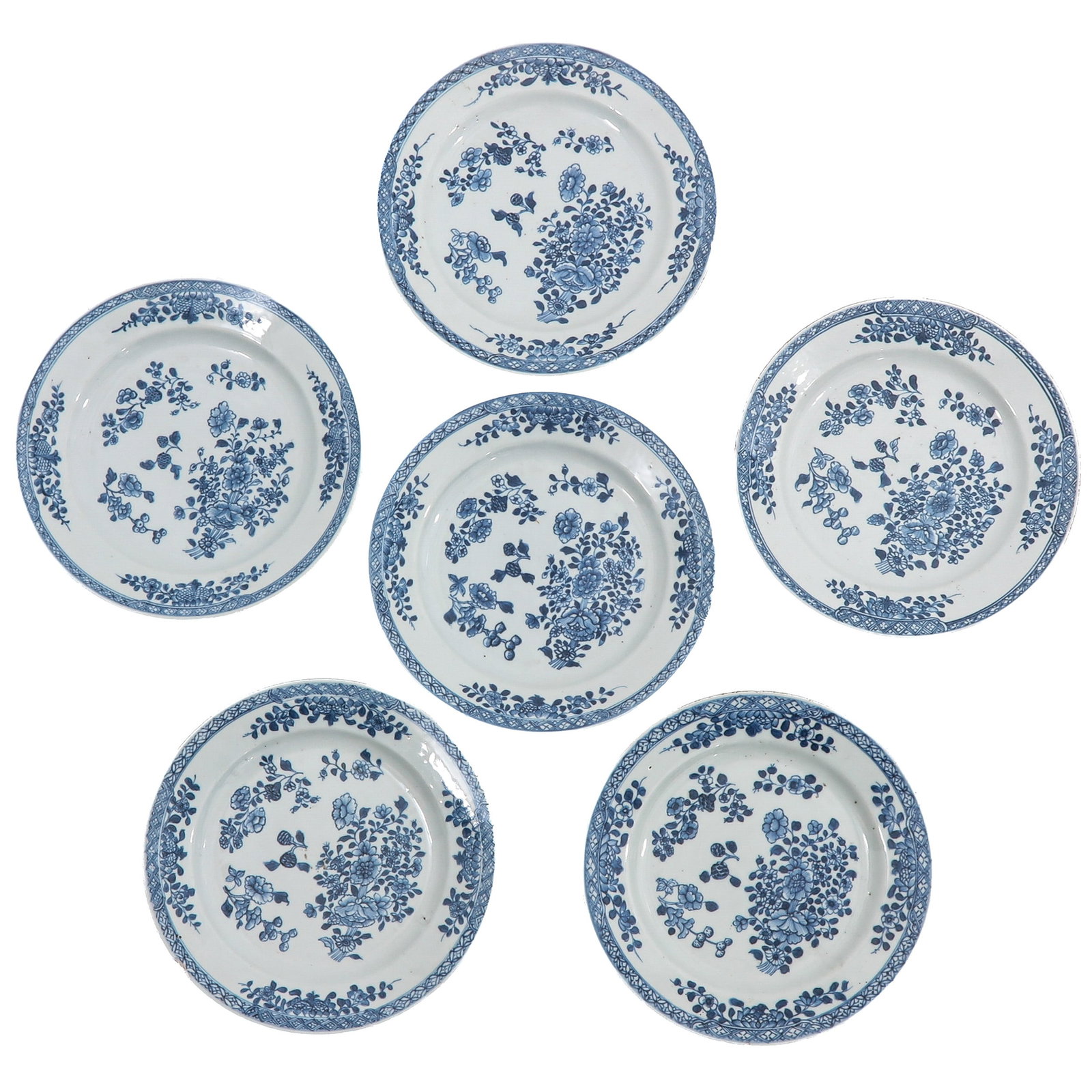 A Series of 6 Blue and White Plates: Decorated with floral motifs, 18th Century, 23 cm. in diameter, chip and hairline.