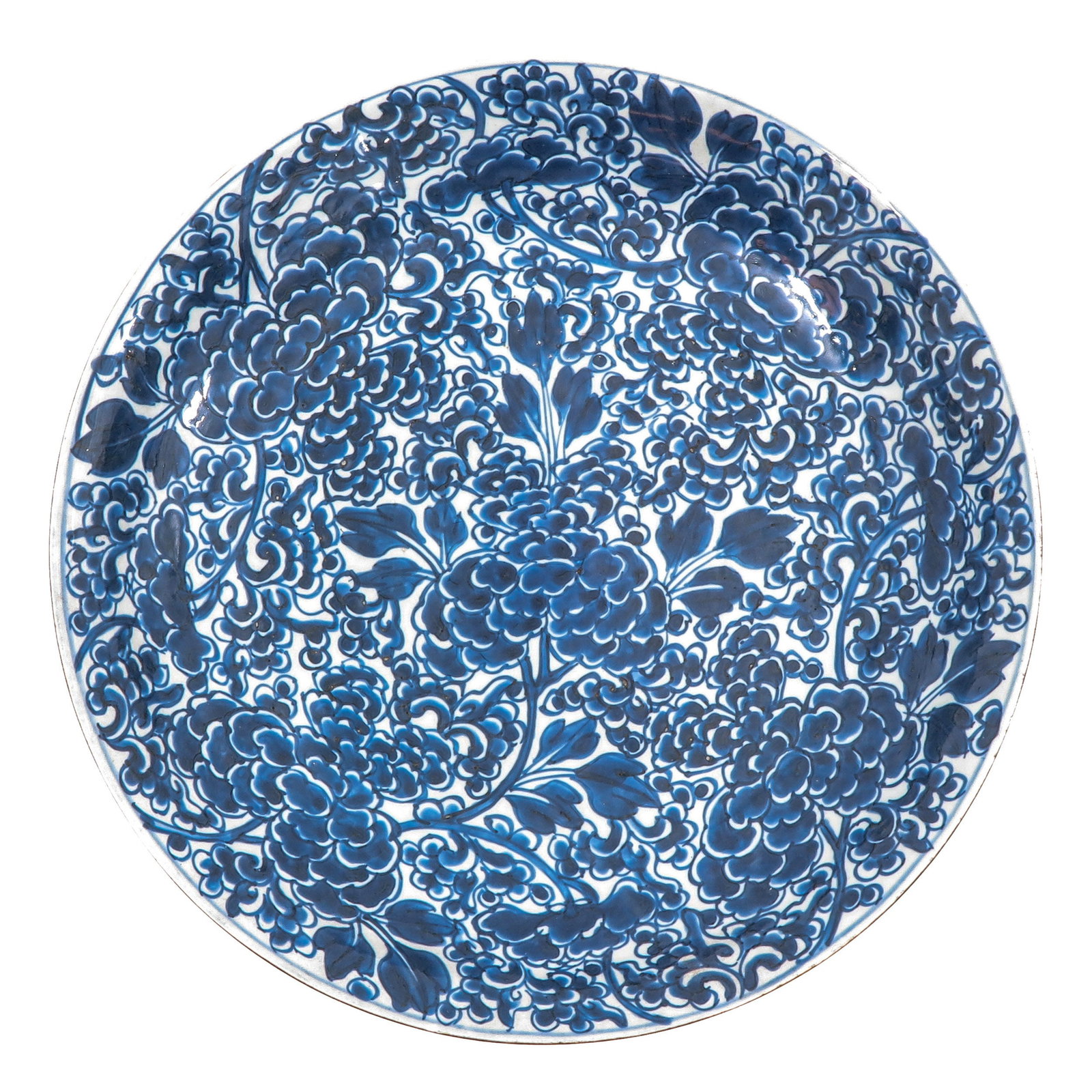 A Blue and White Charger: Full floral decor, 18th Century, 36 cm. in diameter, fritting.