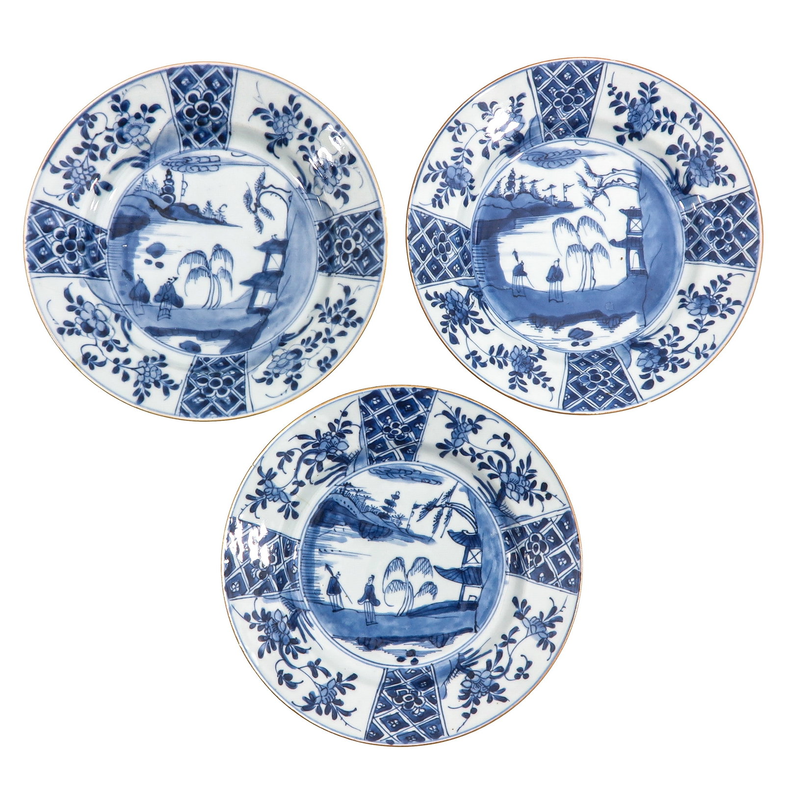 A Group of 3 Blue and White Plates: Decorated with river landscapes, pavilions and floral motifs, 21 cm. in diameter, 18th Century, in diverse conditions.