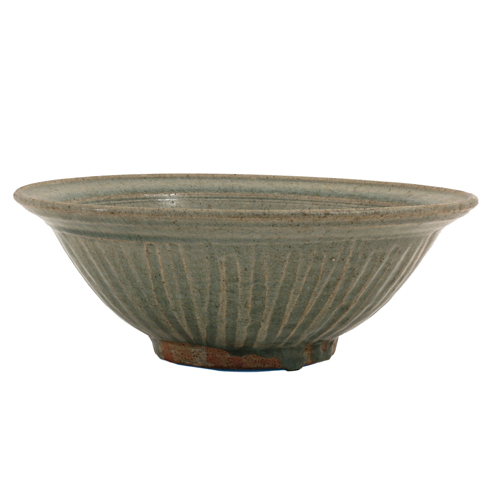 A Celadon Glazed Bowl: Ming dynasty, with ribbed sides, 26 cm. in diameter.