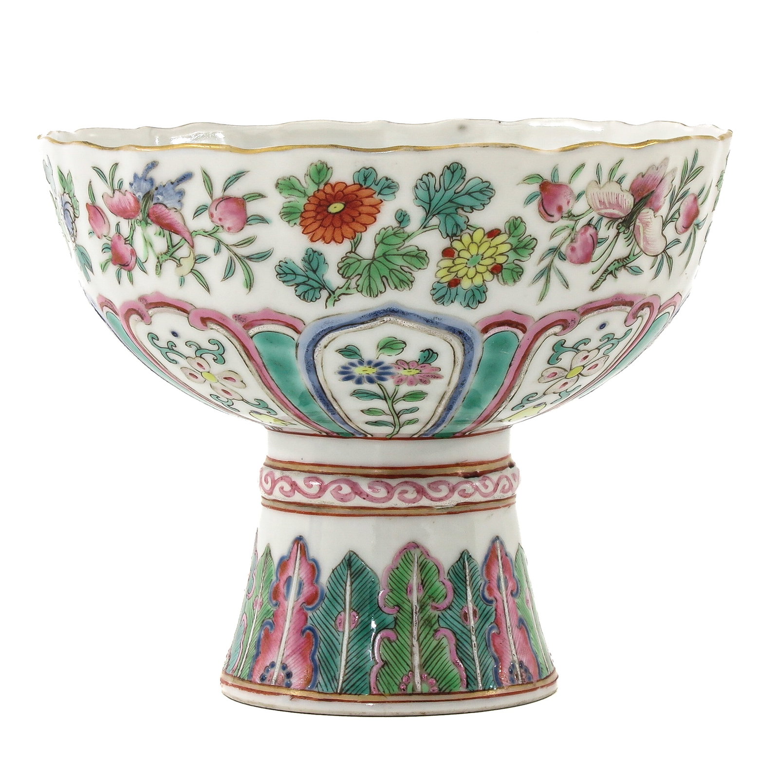 A Famille Rose Stemmed Bowl: Decorated with floral motifs and stylized panels, 19th Century, 14 cm. in diameter, hairline.