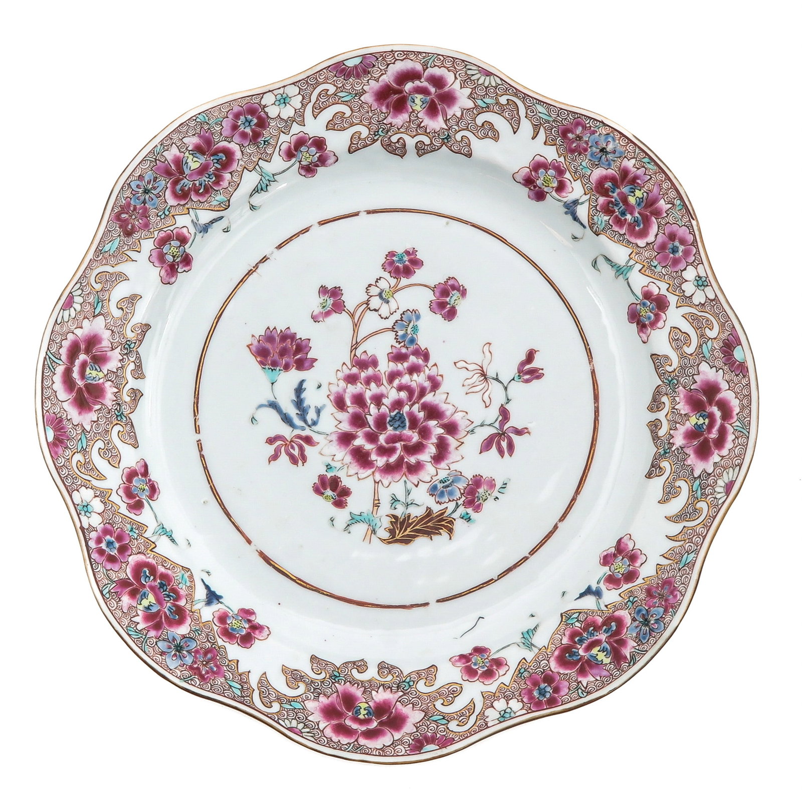 A Famille Rose Serving Plate: Decorated with peony spray and floral scrollwork in pink enamels, 28 cm. in diameter.