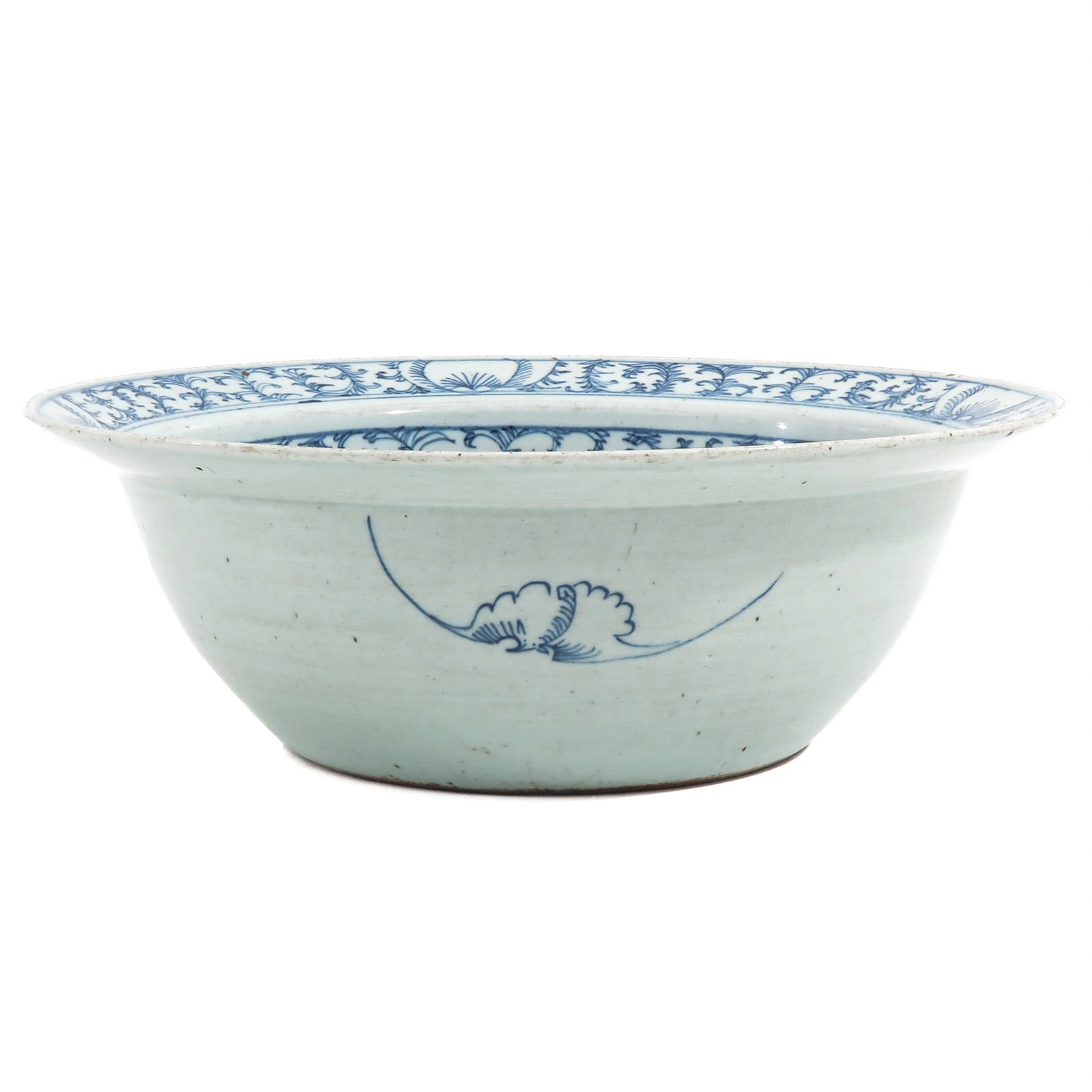 A Blue and White Wash Basin: Decorated with floral motifs and scrolling foliage, 41 cm. in diameter.