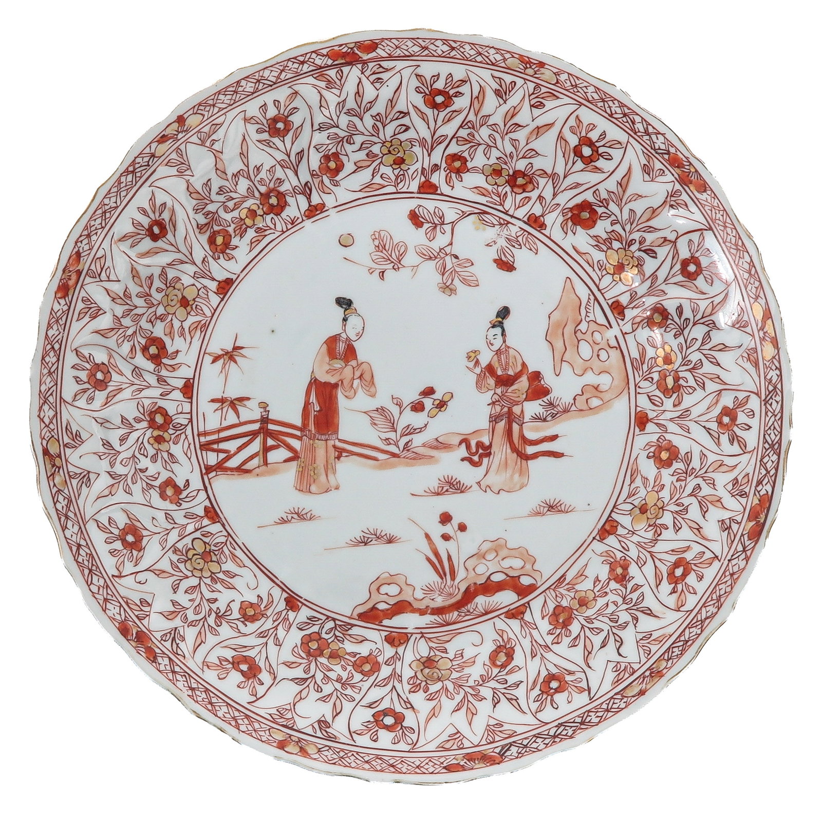 A Milk and Blood Decor Plate: Decorated with 2 ladies in a garden surrounded by a dense floral border, 18th Century, 27 cm. in diameter, chip and hairline.