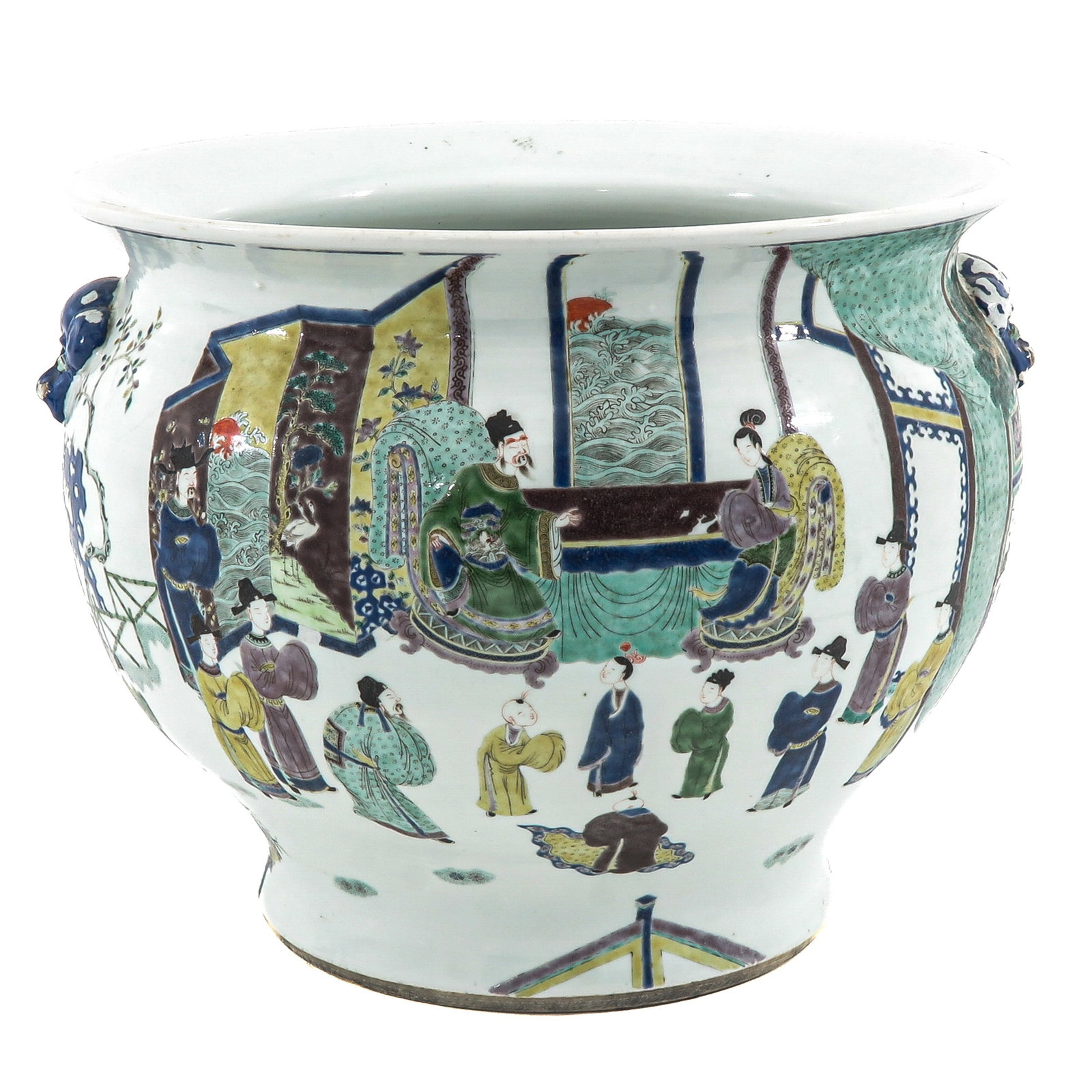 A Famille Verte Jardiniere: Decorated with court figures in an interior setting, 38 cm. tall.
