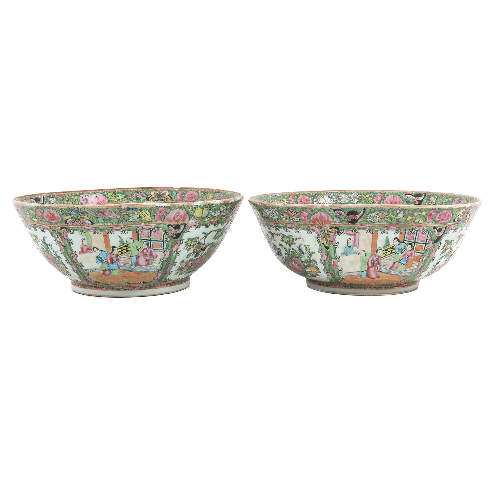 A Pair of Cantonese Serving Bowls: Richly decorated with figures in interior scenes, 34 cm. in diameter.