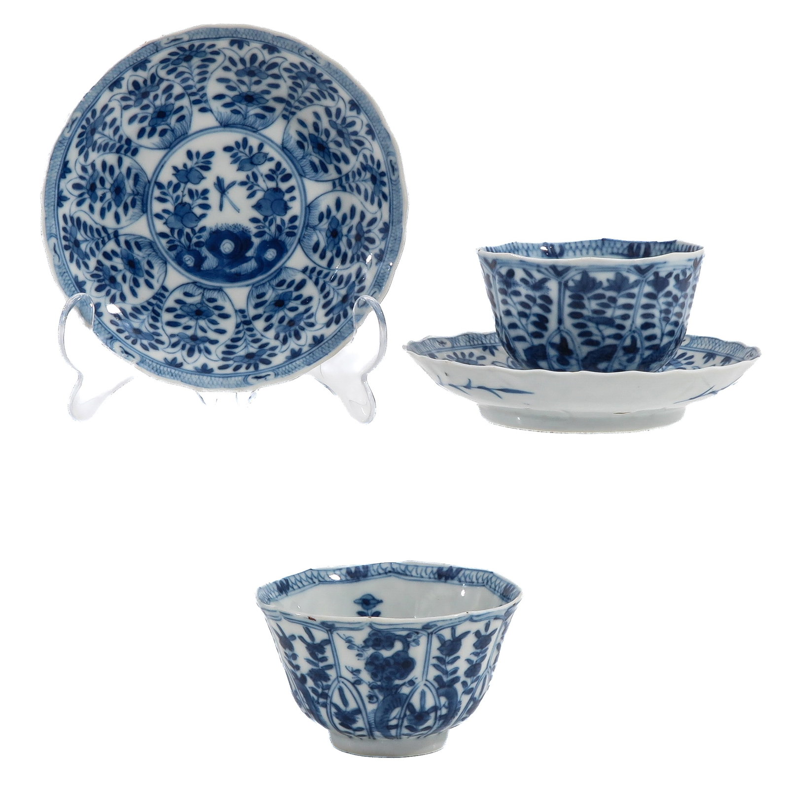 A Lot of 2 Cups and Saucers: Full floral decor, with petal molded rims, saucers are 13 cm. in diameter, chip.