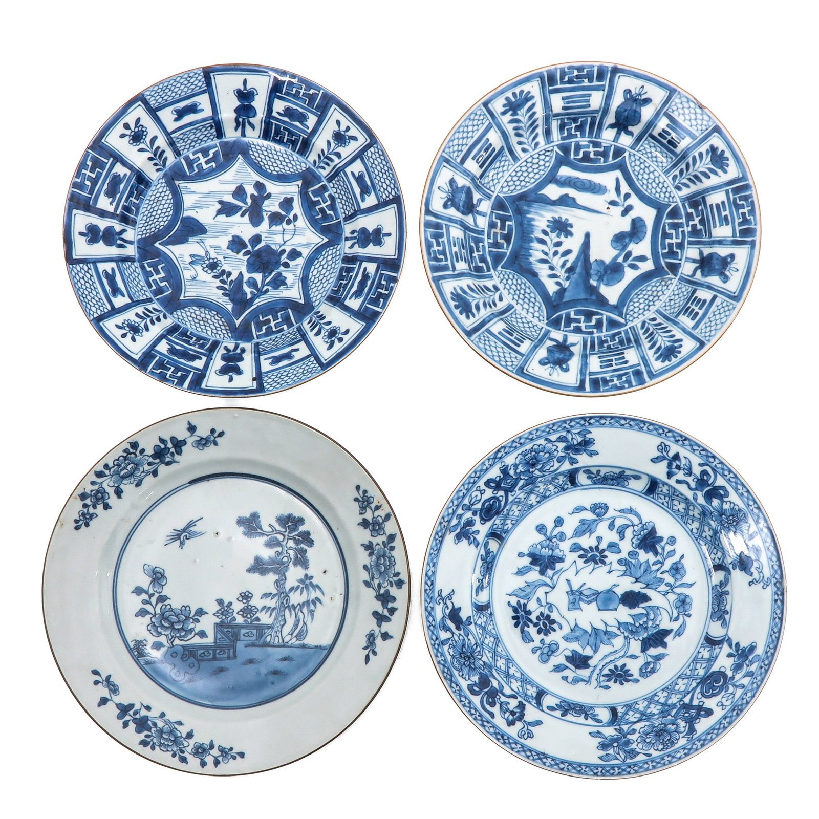 A Group of 4 Blue and White Plates: Decorated with floral spray and garden scenes, 18th Century, 24 cm. in diameter, in diverse conditions.