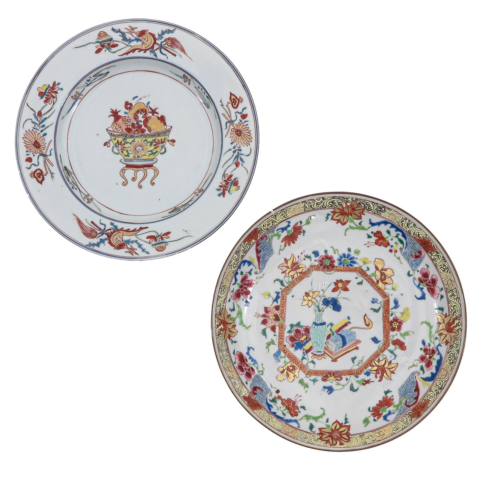 A Lot of 2 Plates: One decorated with a central basket of flowers and fruit, the other with a polychrome floral design, 18th Century, 22 cm. in diameter, chip and hairline.
