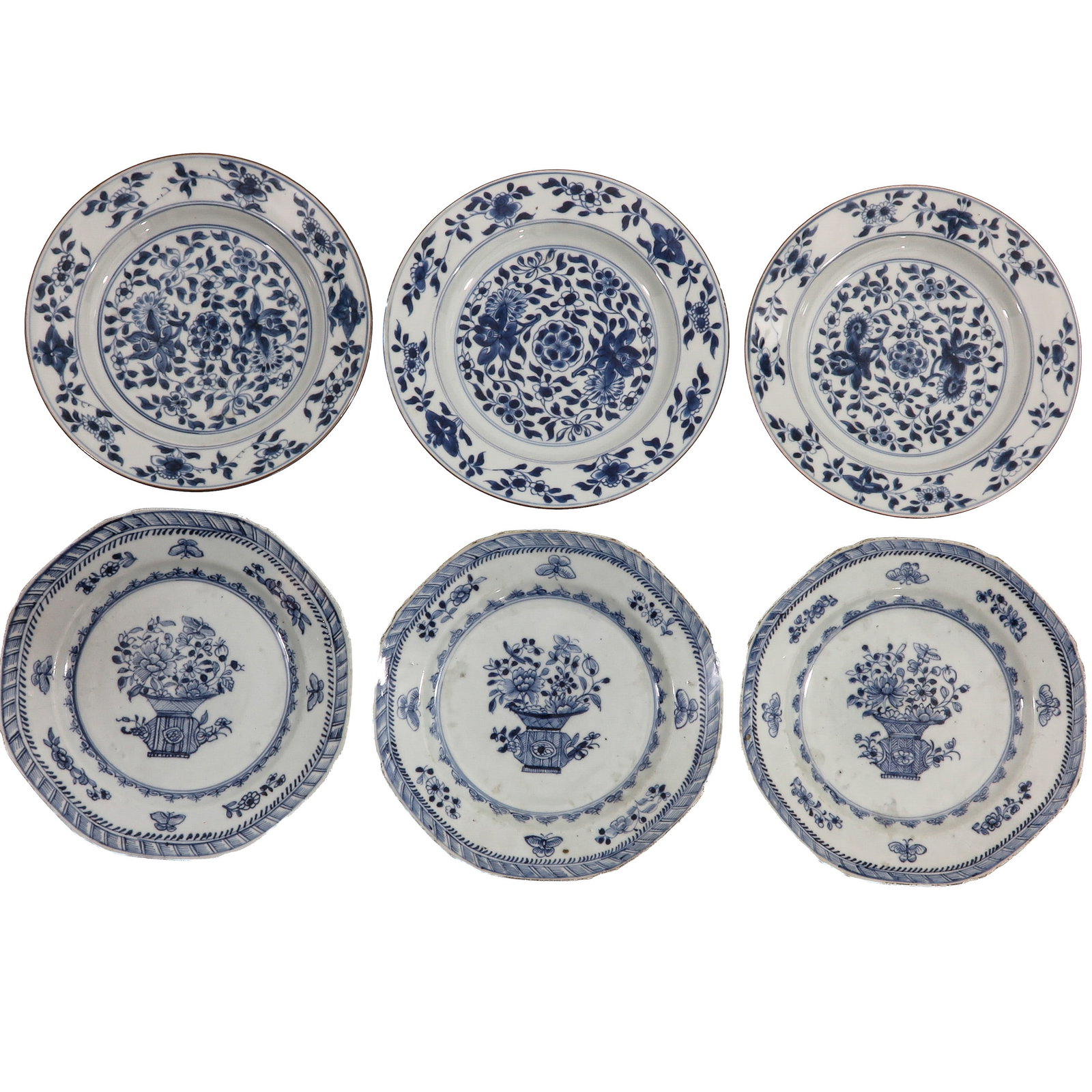 A Group of 6 Blue and White Plates: Including 3 decorated with floral motifs and 3 with a flower basket, 18th Century, 23 cm. in diameter, chip and hairline.