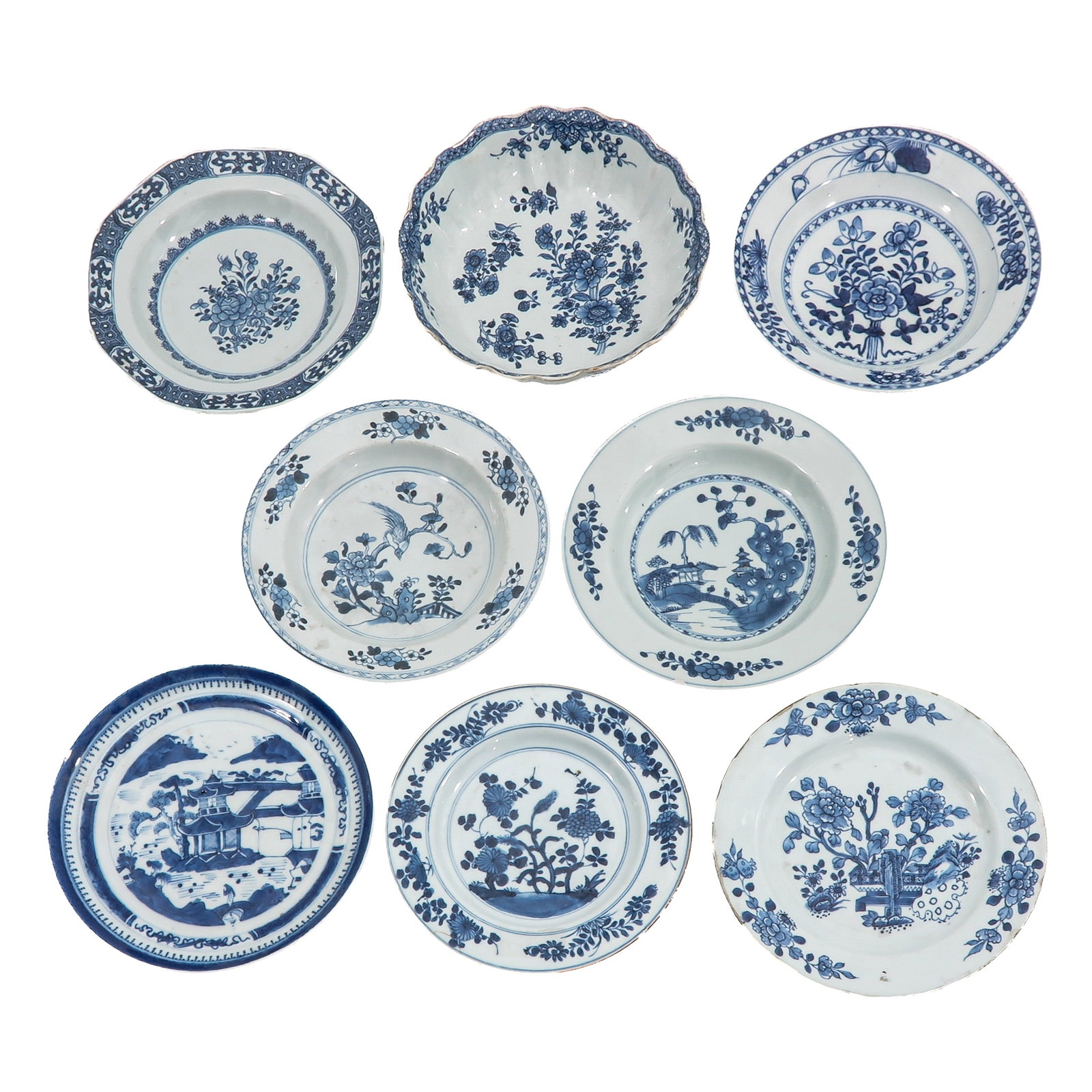 A Group of Blue and White Plates: In a variety of decors and sizes, including 18th Century, largest plate is 24 cm. in diameter, in diverses conditions.