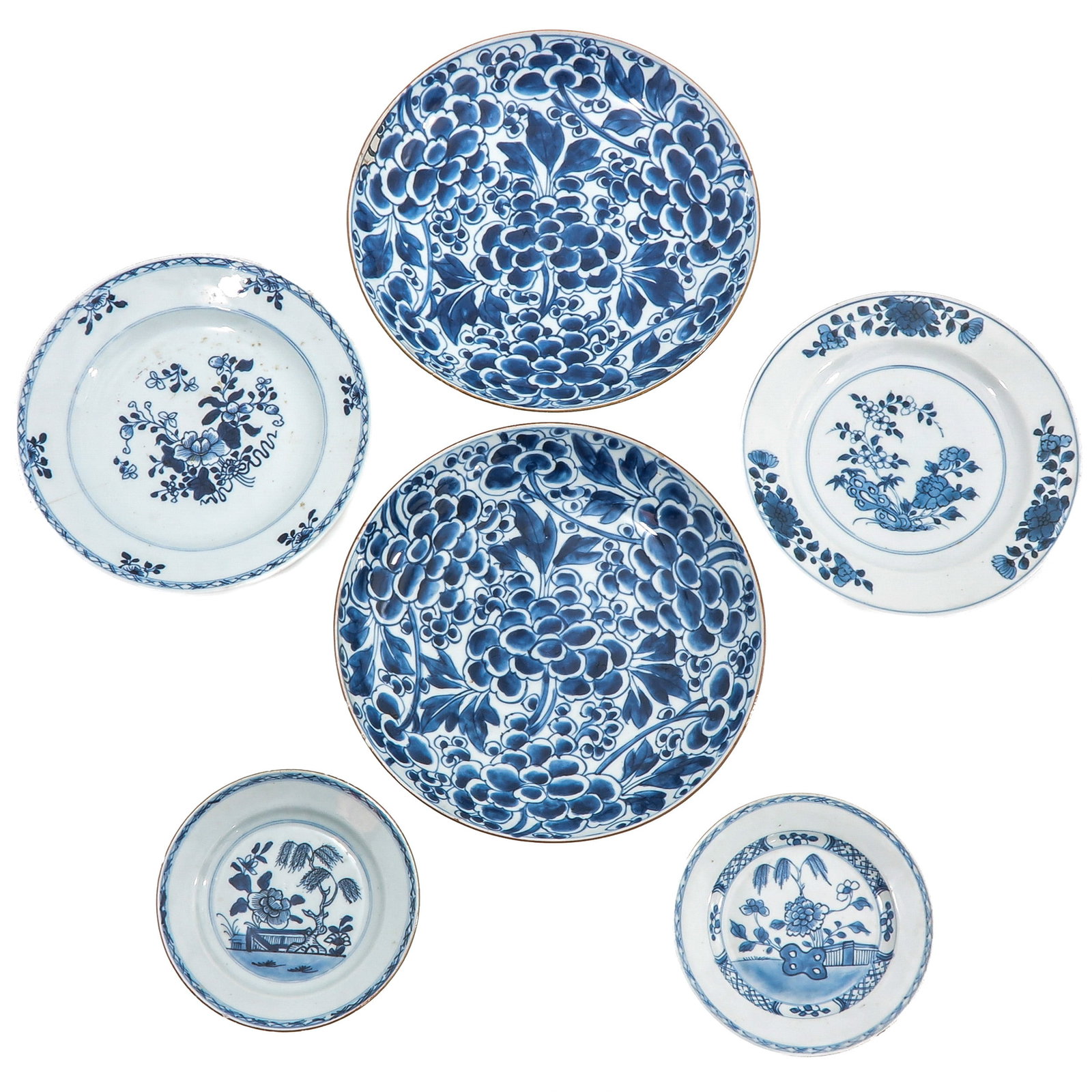 A Group of 6 Blue and White Plates: In a variety of decors, 18th Century, largest plate is 27 cm. in diameter, in diverse conditions.