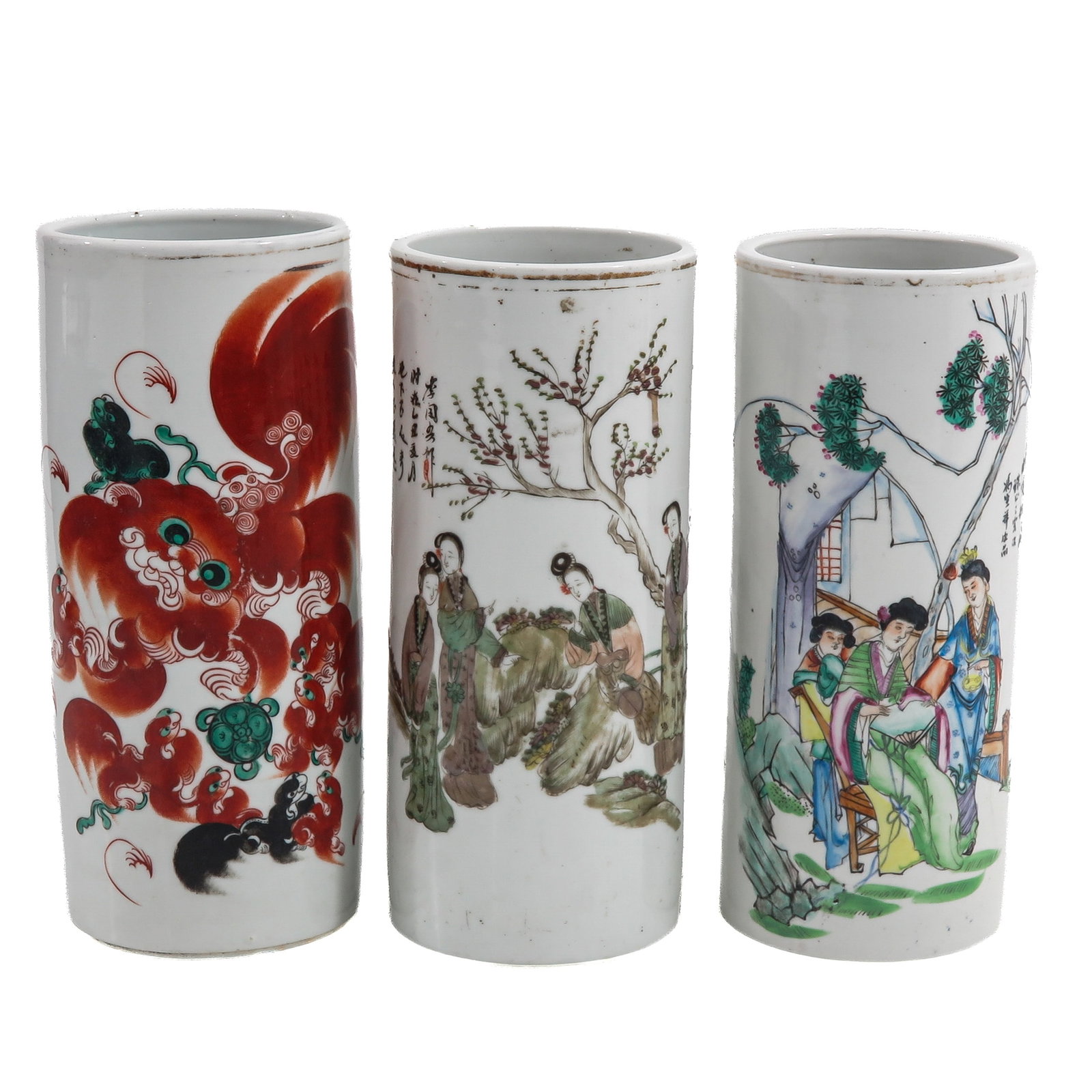 A Group of 3 Cylindrical Vases: Variously decorated with Buddhist lions and figural garden scenes, 19th Century, 29 cm. tall, hairline.