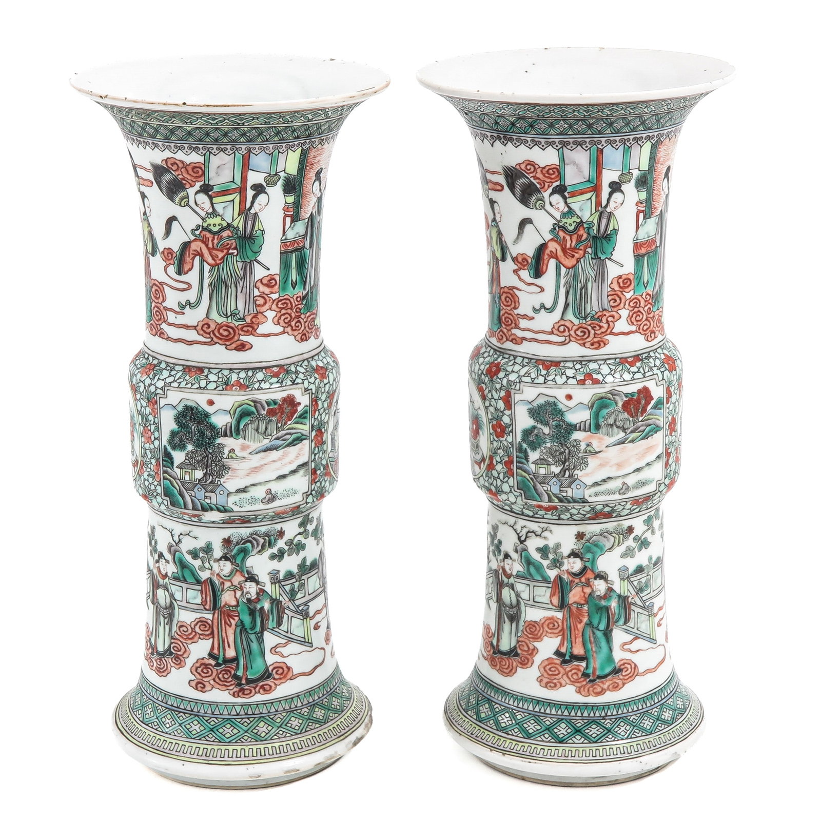 A Pair of Famille Verte Yen Yen Vases: Decorated with figures in landscapes and panelled scenes, 35 cm. tall, chip and hairline.