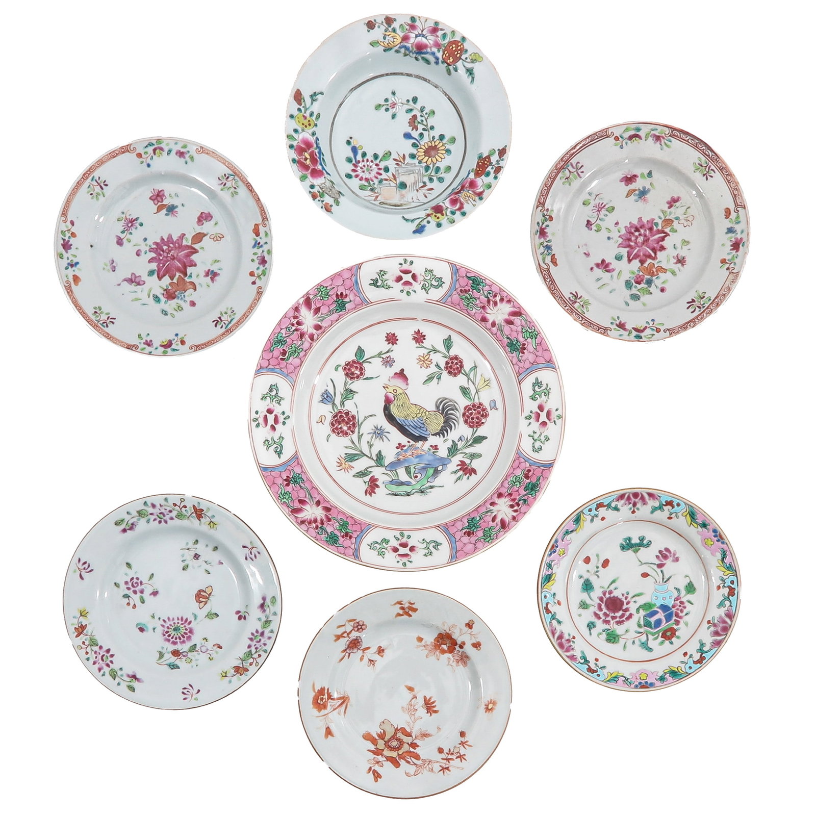 A Group of 7 Famille Rose Porcelain Plates: In a variety of decors and sizes, including 18th Century, largest plate is 24 cm. in diameter, in diverses conditions.