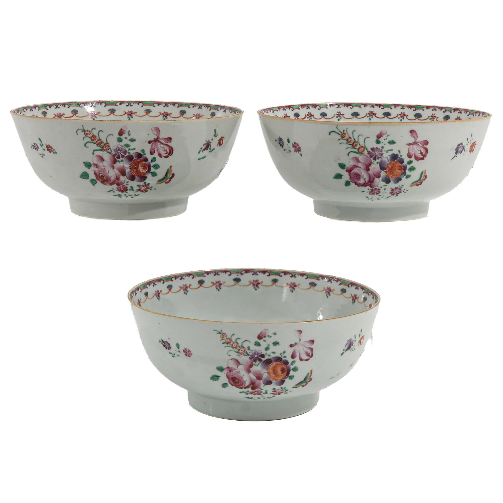 A Group of 3 Famille Rose Bowls: Qianlong Period, 18th Century, decorated with floral sprays and gilt rim, 23 cm. in diameter.