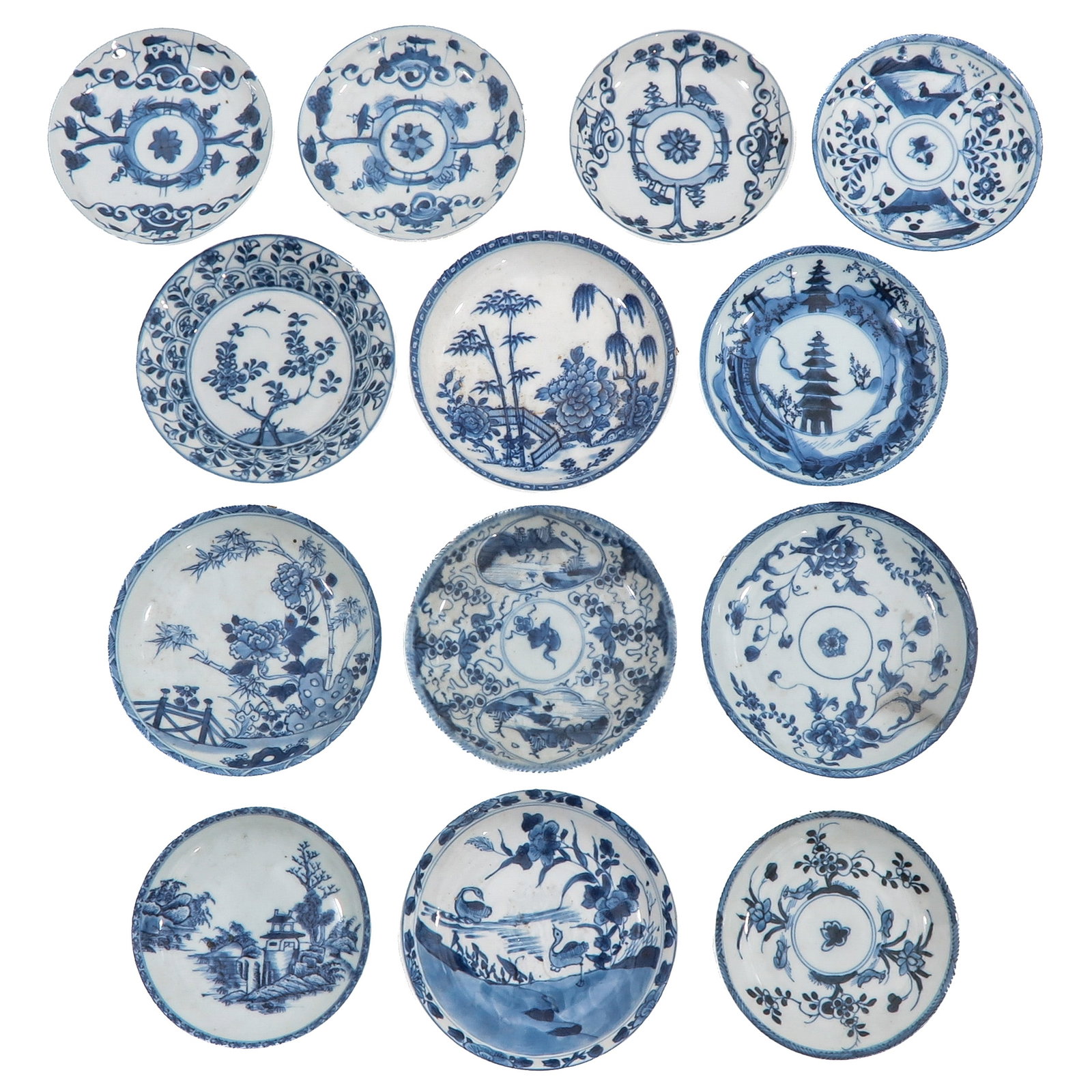 A Group of Blue and White Saucers: In a variety of decors and sizes, including 18th Century, largest saucer is 13 cm. in diameter, in diverse conditions.