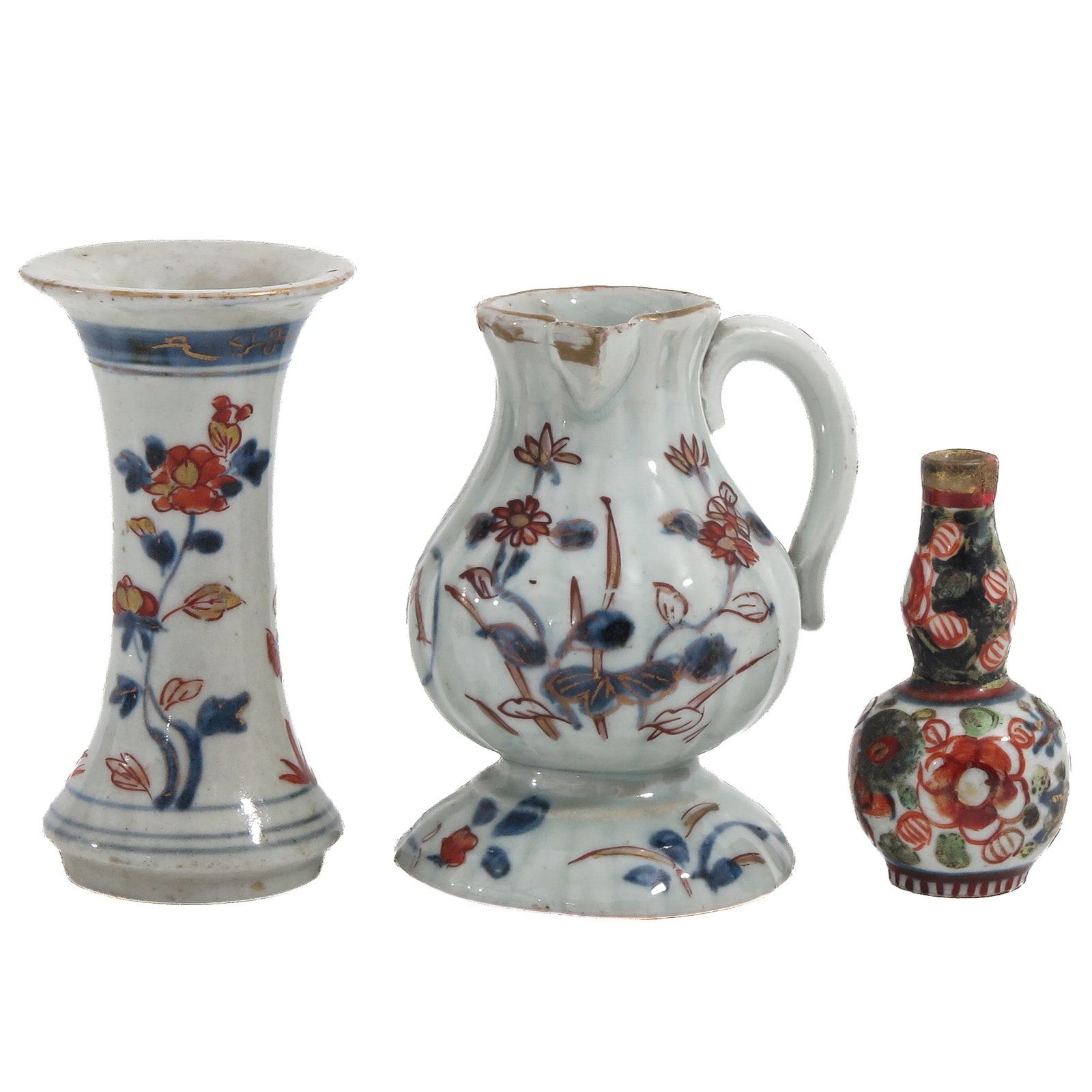 A Diverse Collection of Porcelain: Including a beaker vase, an Imari ewer and a small polychrome gourd vase, including 18th Century, tallest vase is 10 cm., in diverse conditions.