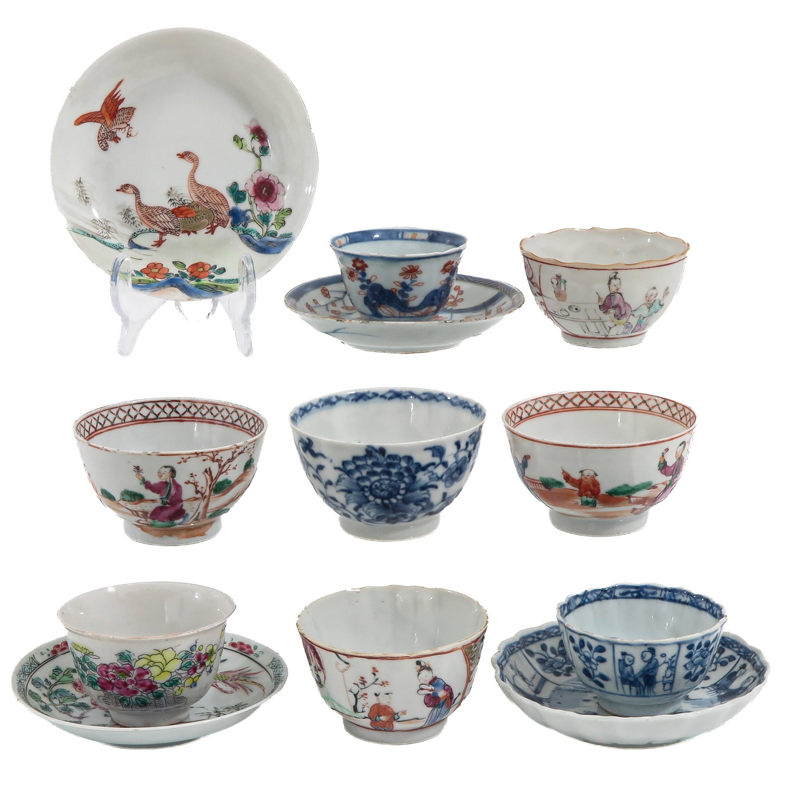 A Collection of Cups and Saucers: In a variety of decors, including 18th Century, largest saucer is 11 cm., chip and hairline.