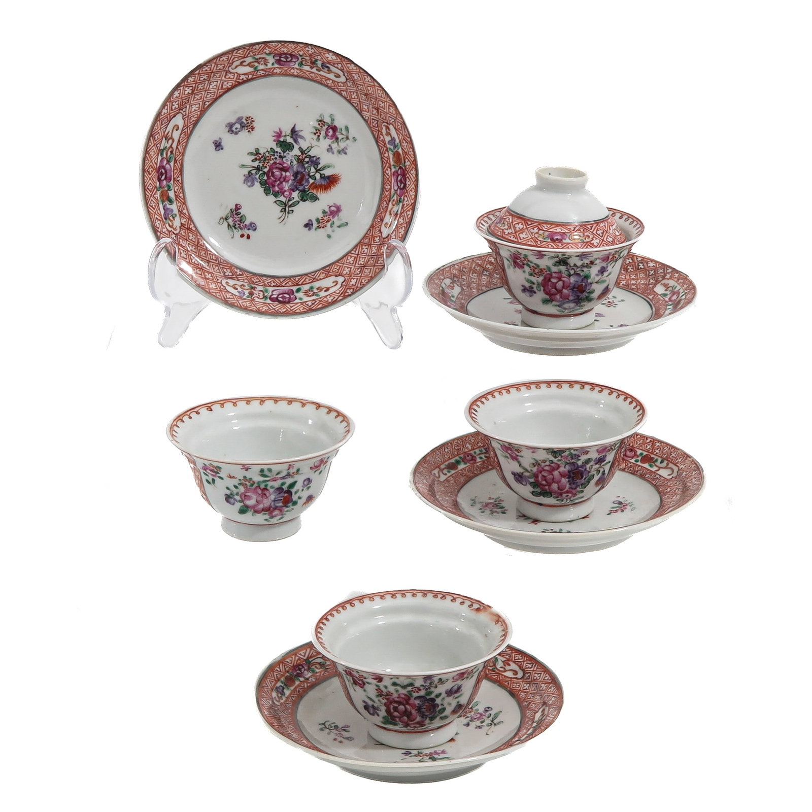 A Group of Famille Rose Cups and Saucers: Including 4 cups, 4 saucers and 1 cover, 18th Century, saucers are 11 cm. in diameter.