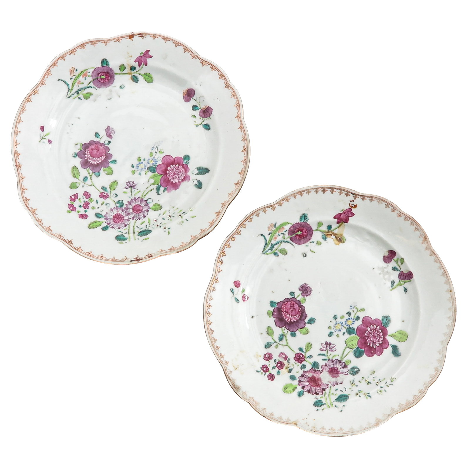 A Pair of Famille Rose Plates: Floral decor, 18th Century, 23 cm. in diameter, chip.