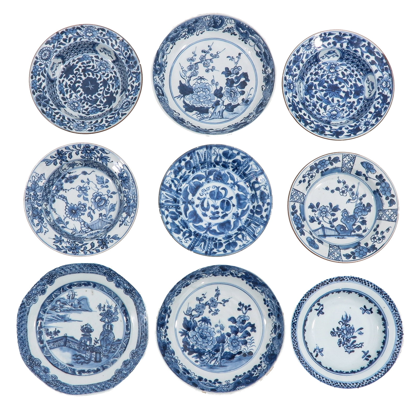 A Group of Blue and White Dishes: In a variety of blue and white decors, including 18th Century, largest plate is 20 cm. in diameter, in diverse conditions.