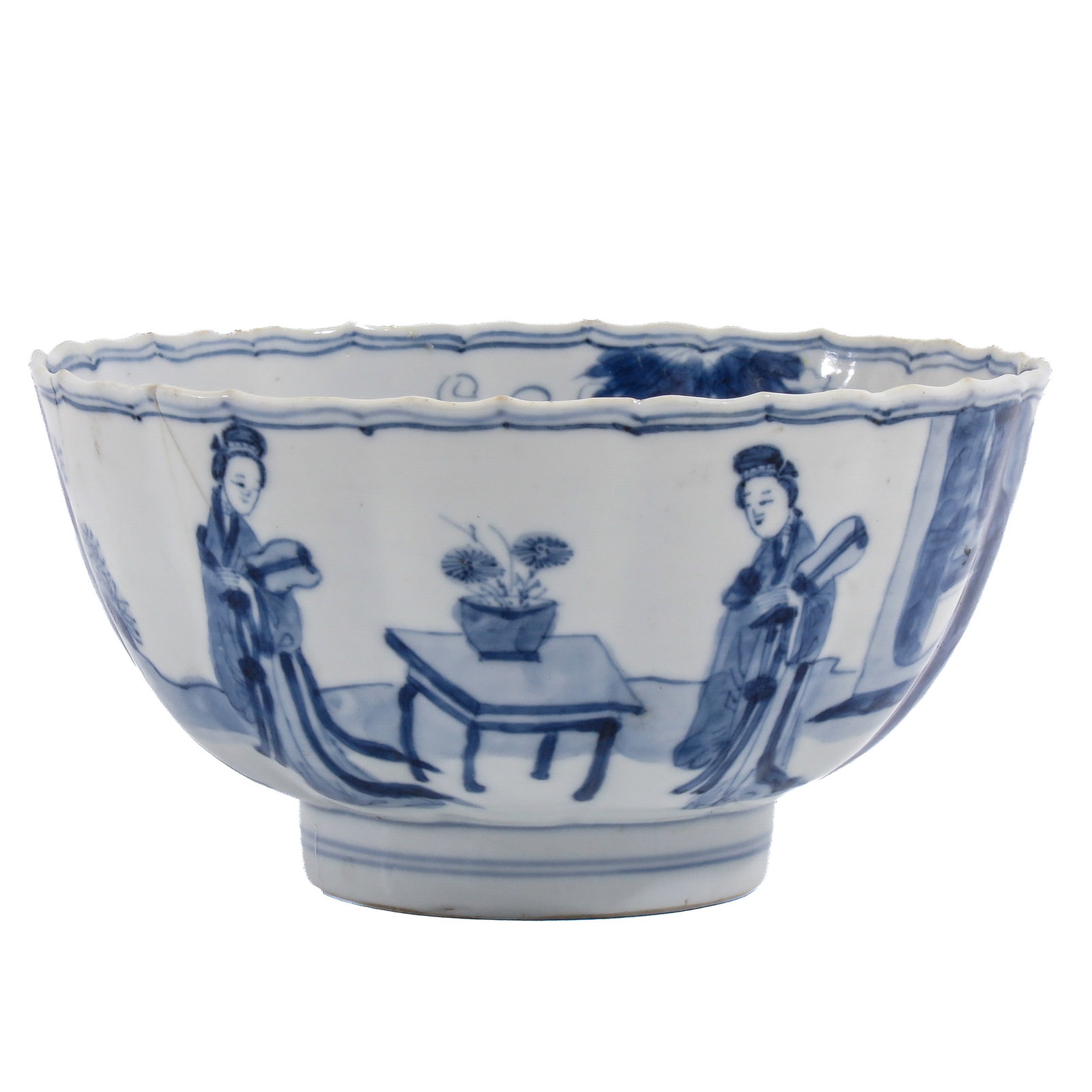 A Blue and White Bowl: Depicting 2 ladies seated beside a table with a flower pot in an interior, Chenhua mark, Kangxi Period, 13 cm. in diameter, chip and hairline.